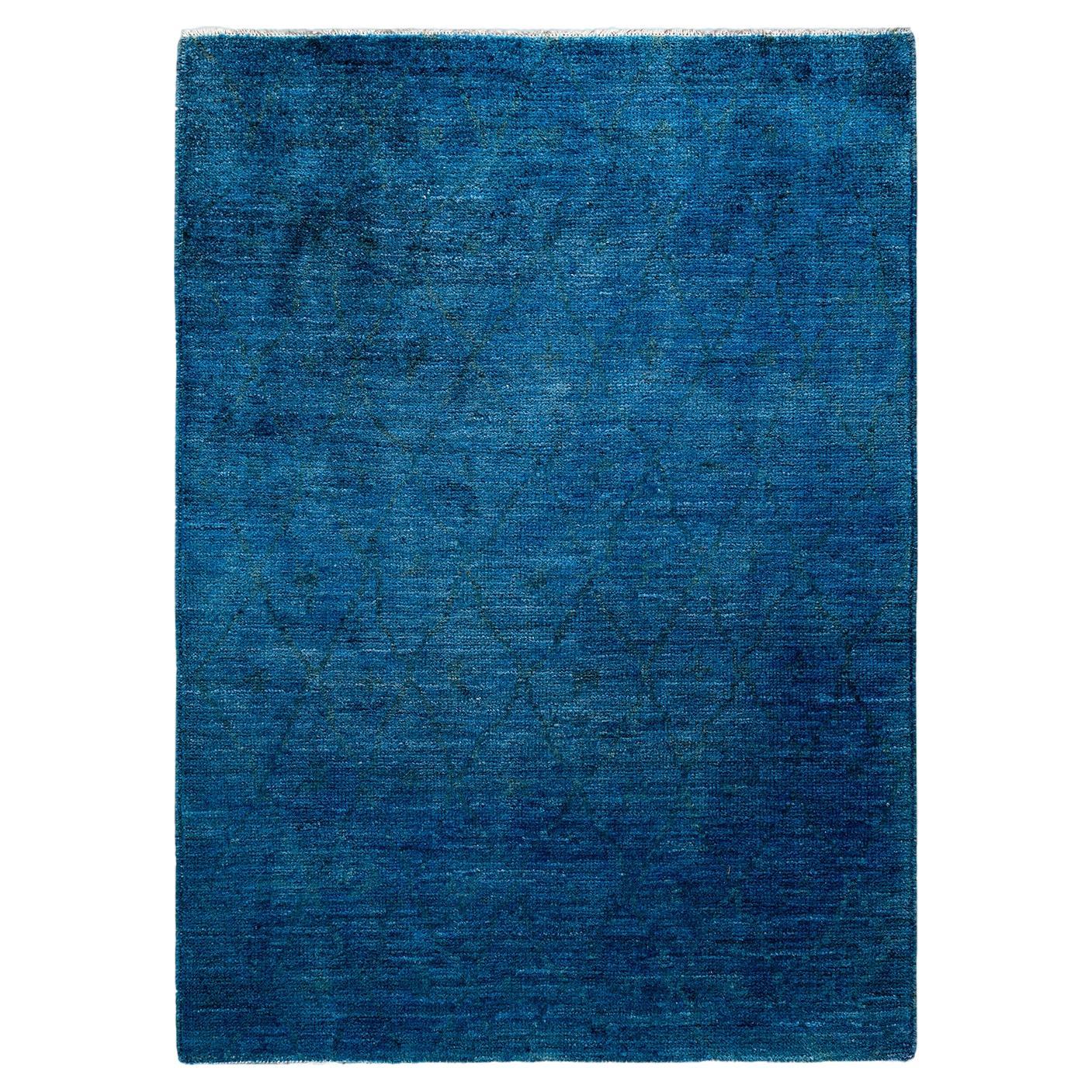 Tappeto contemporaneo in lana sovratinta annodata a mano di colore blu