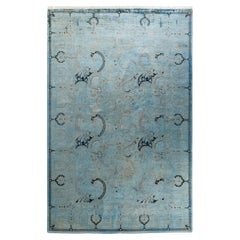 Tapis de sol contemporain en laine surteinte nouée à la main, bleu