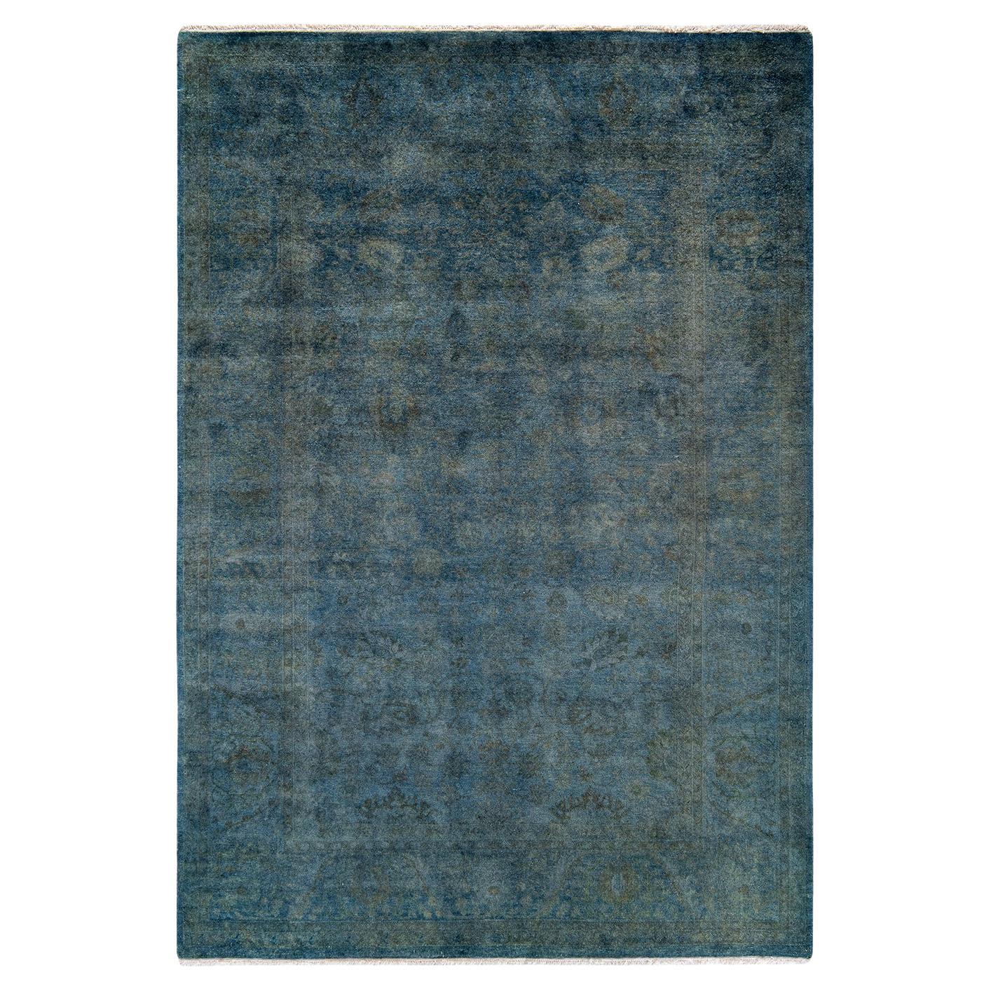 Tappeto contemporaneo in lana sovratinta annodata a mano di colore blu