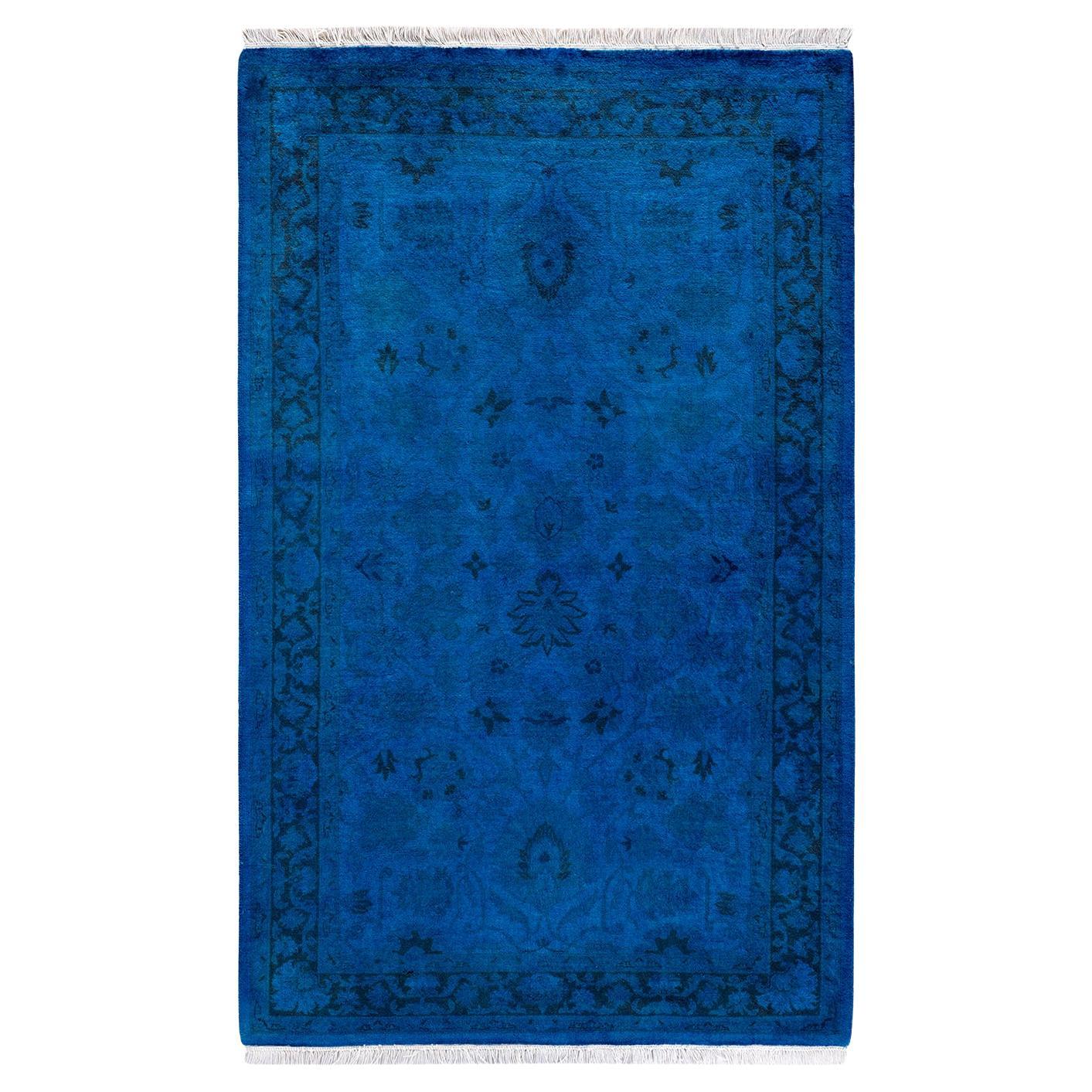 Tappeto contemporaneo in lana sovratinta annodata a mano di colore blu