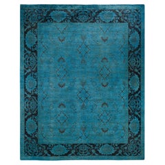 Tappeto contemporaneo in lana sovratinta annodata a mano di colore blu