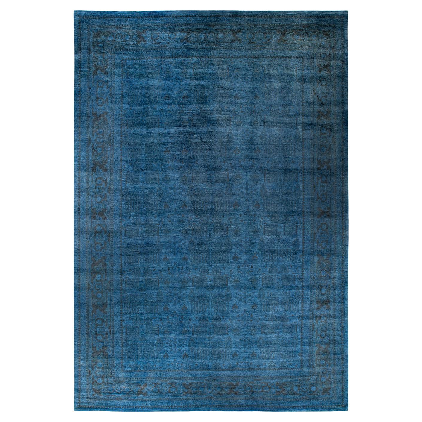 Tappeto contemporaneo in lana sovratinta annodata a mano di colore blu