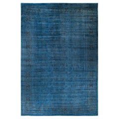 Tappeto contemporaneo in lana sovratinta annodata a mano di colore blu