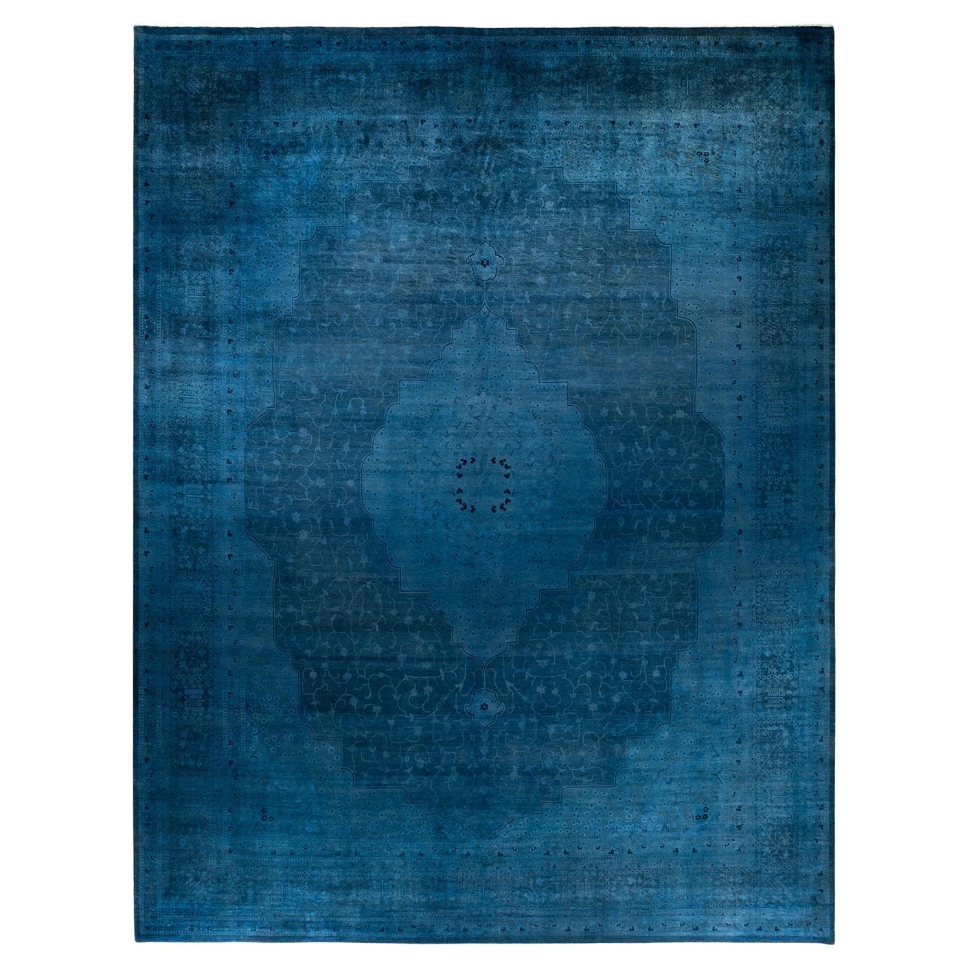 Tappeto contemporaneo in lana sovratinta annodata a mano di colore blu