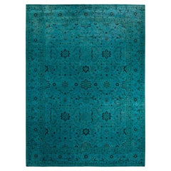 Tapis de sol contemporain en laine surteinte nouée à la main, bleu