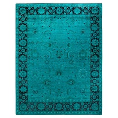Tapis de sol contemporain en laine surteinte nouée à la main, bleu