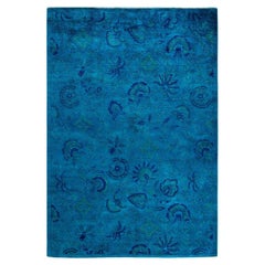 Tapis de sol contemporain en laine surteinte nouée à la main, bleu