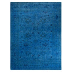Tappeto contemporaneo in lana sovratinta annodata a mano di colore blu