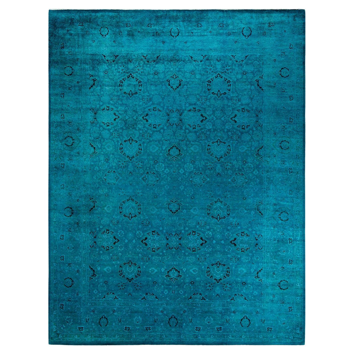 Tappeto contemporaneo in lana sovratinta annodata a mano di colore blu