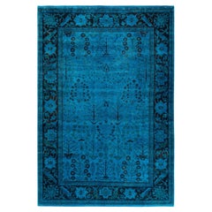 Tapis de sol contemporain en laine surteinte nouée à la main, bleu