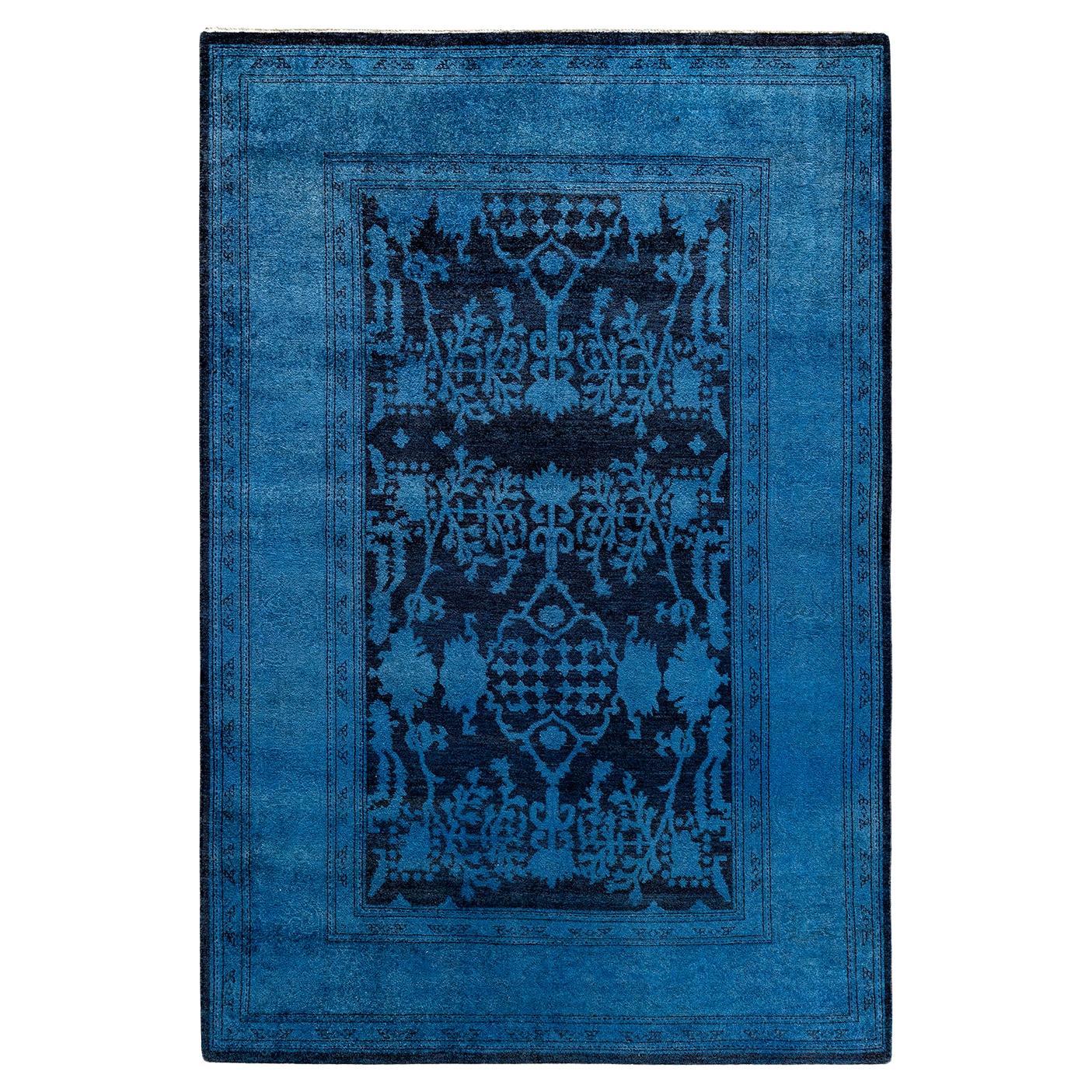 Tappeto contemporaneo in lana sovratinta annodata a mano di colore blu