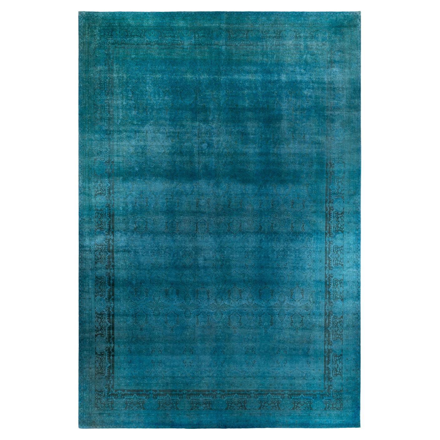 Tappeto contemporaneo in lana sovratinta annodata a mano di colore blu