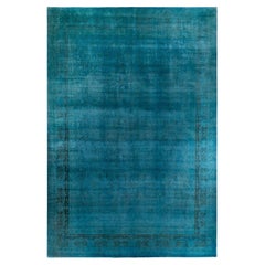 Tappeto contemporaneo in lana sovratinta annodata a mano di colore blu