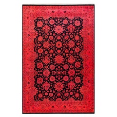 Tappeto contemporaneo in lana rosso sovratinto e annodato a mano