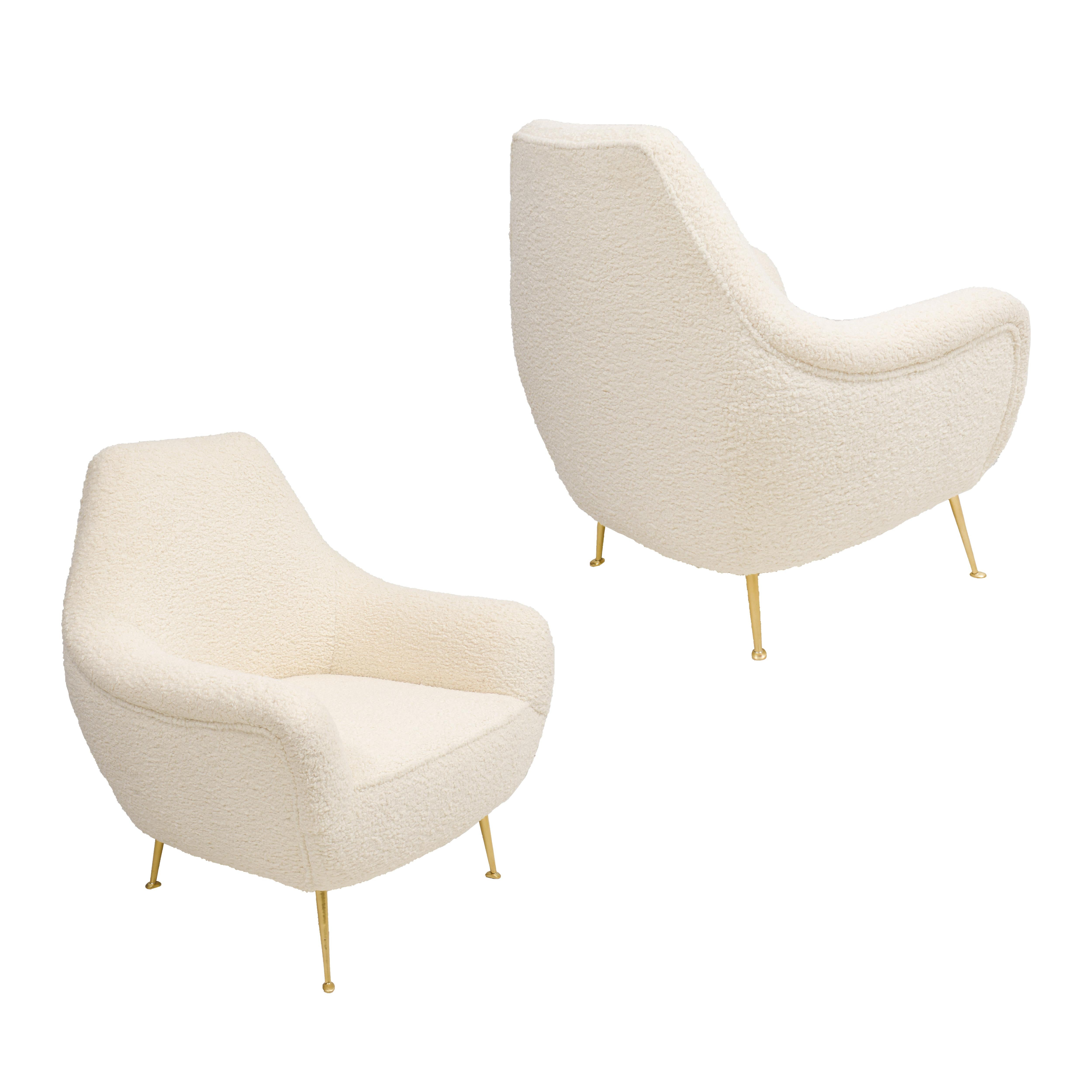 Custom pair of Italian lounge chairs in the mid-century manner upholstered in boucle. Please note the lead time for custom made is 8-10 weeks.
NOTE:  Upholstery with COM is additional.