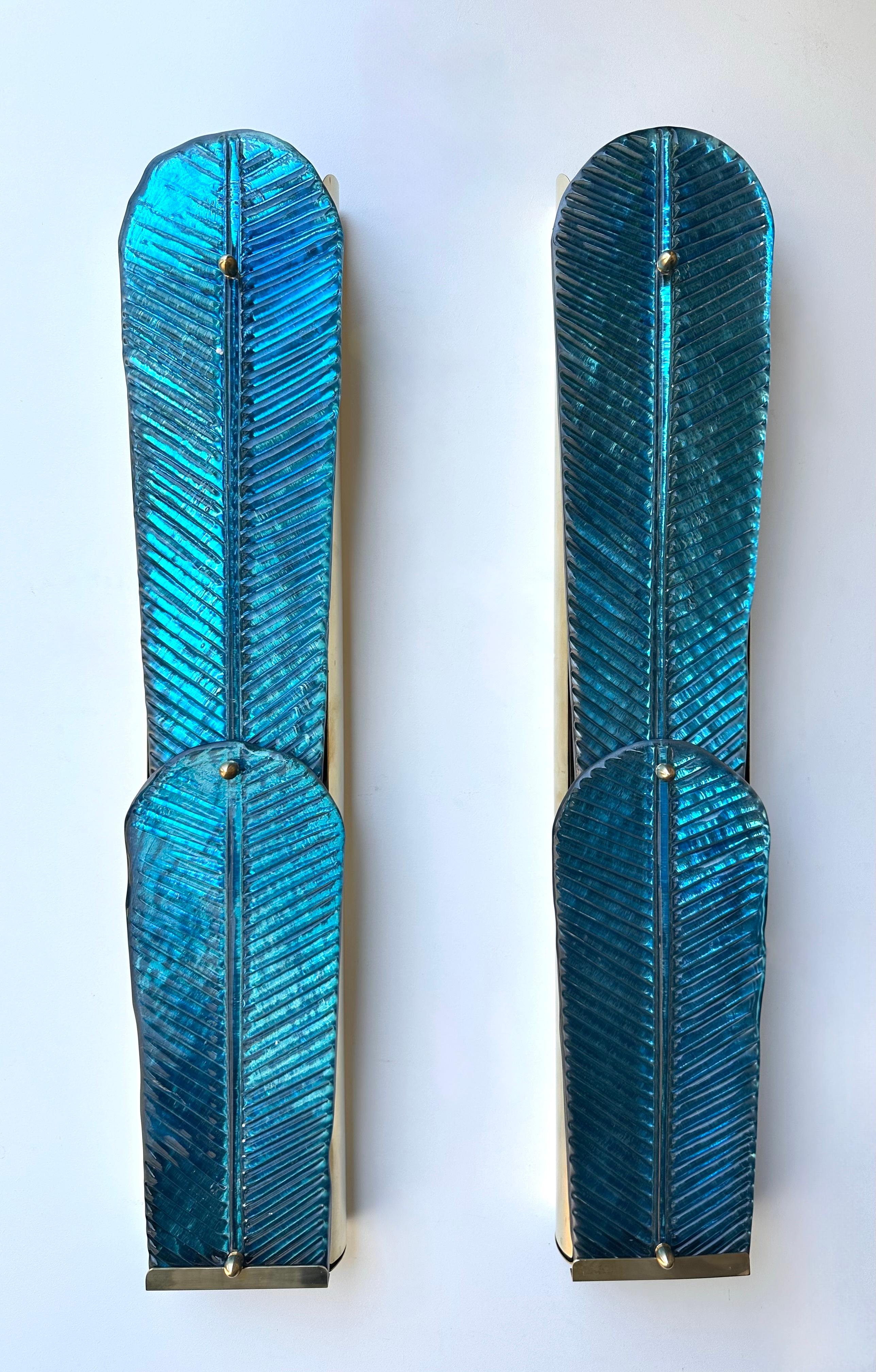 Large Pair of Contemporary Blue Murano glass brass palm tree leaf wall lights lighting lamps sconces. Contemporary work from a small artisanal italian design workshop. Minor imperfections due to artisanal hand made. In the mood of Mid-Century