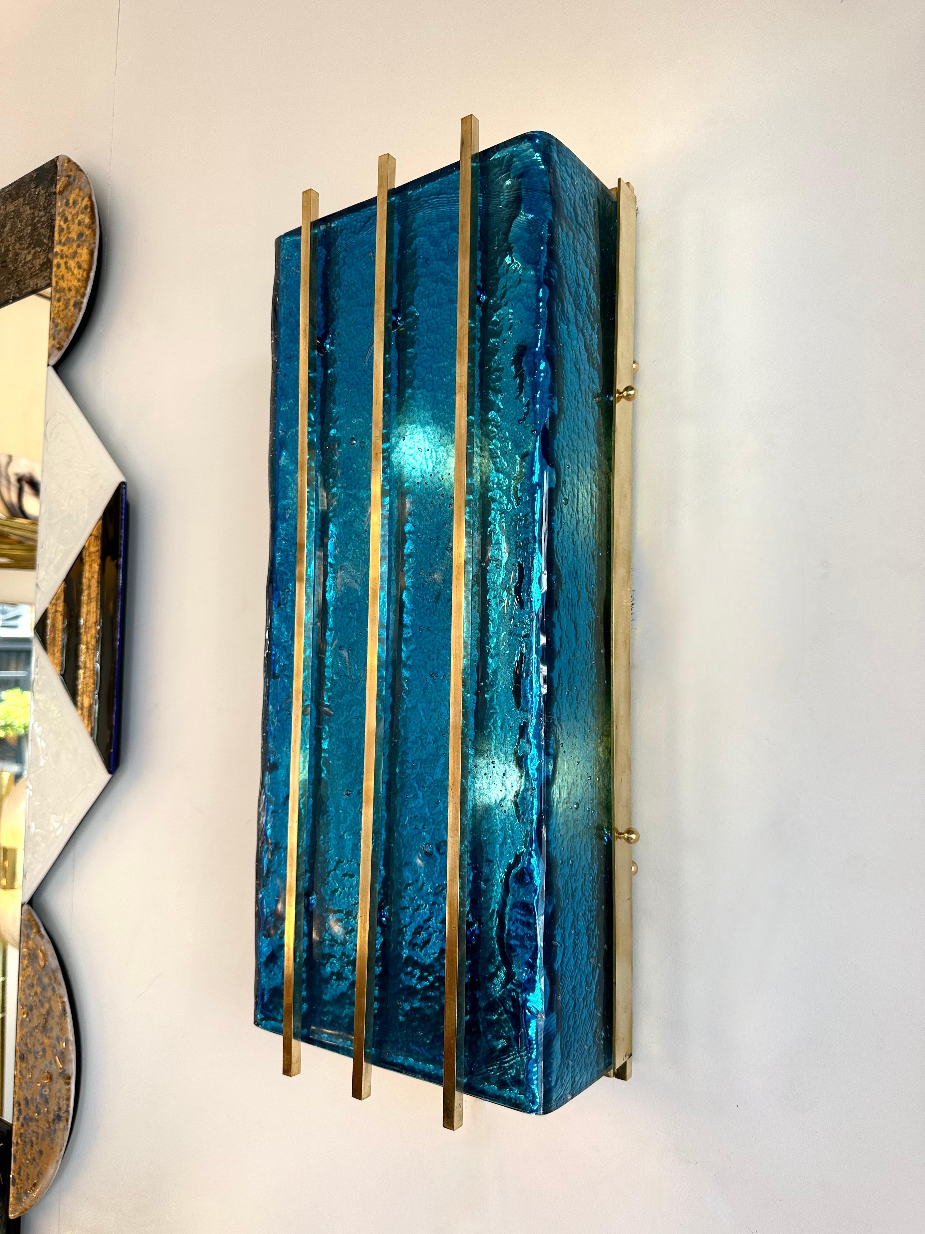 Pair of brass and blue Murano glass wall lights lightning pannel lamps sconces. Contemporary work from a small artisanal italian design workshop. Made with old stock of glass from the manufacture Salviati. In the mood of Mid-Century Modern,