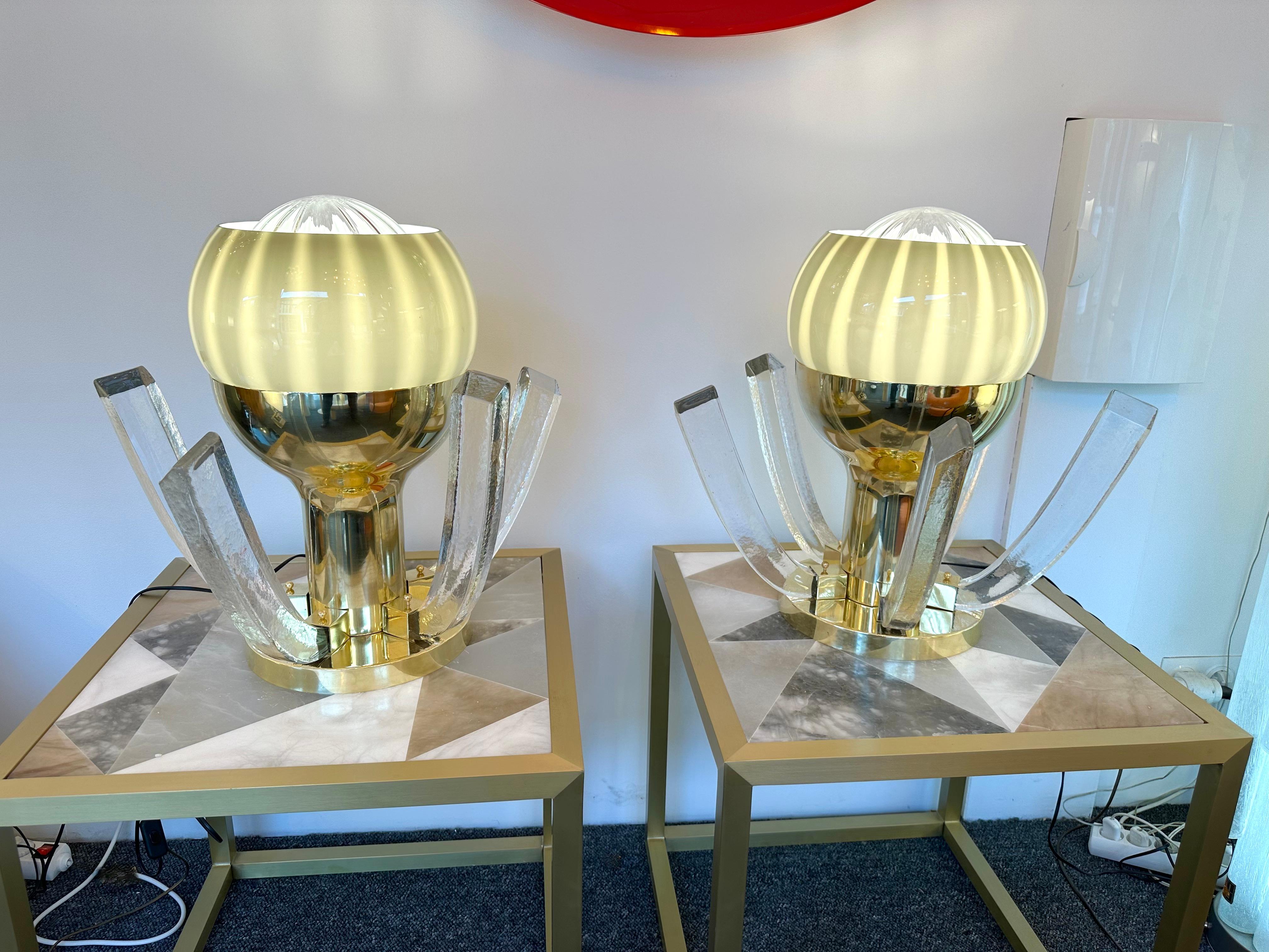 Pair of table or bedside brass flower lamps, gray white interior Murano glass globe and massive glass horn. Contemporary work from a small italian artisanal workshop in a Mid-Century Modern Space Age Hollywood Regency mood.

