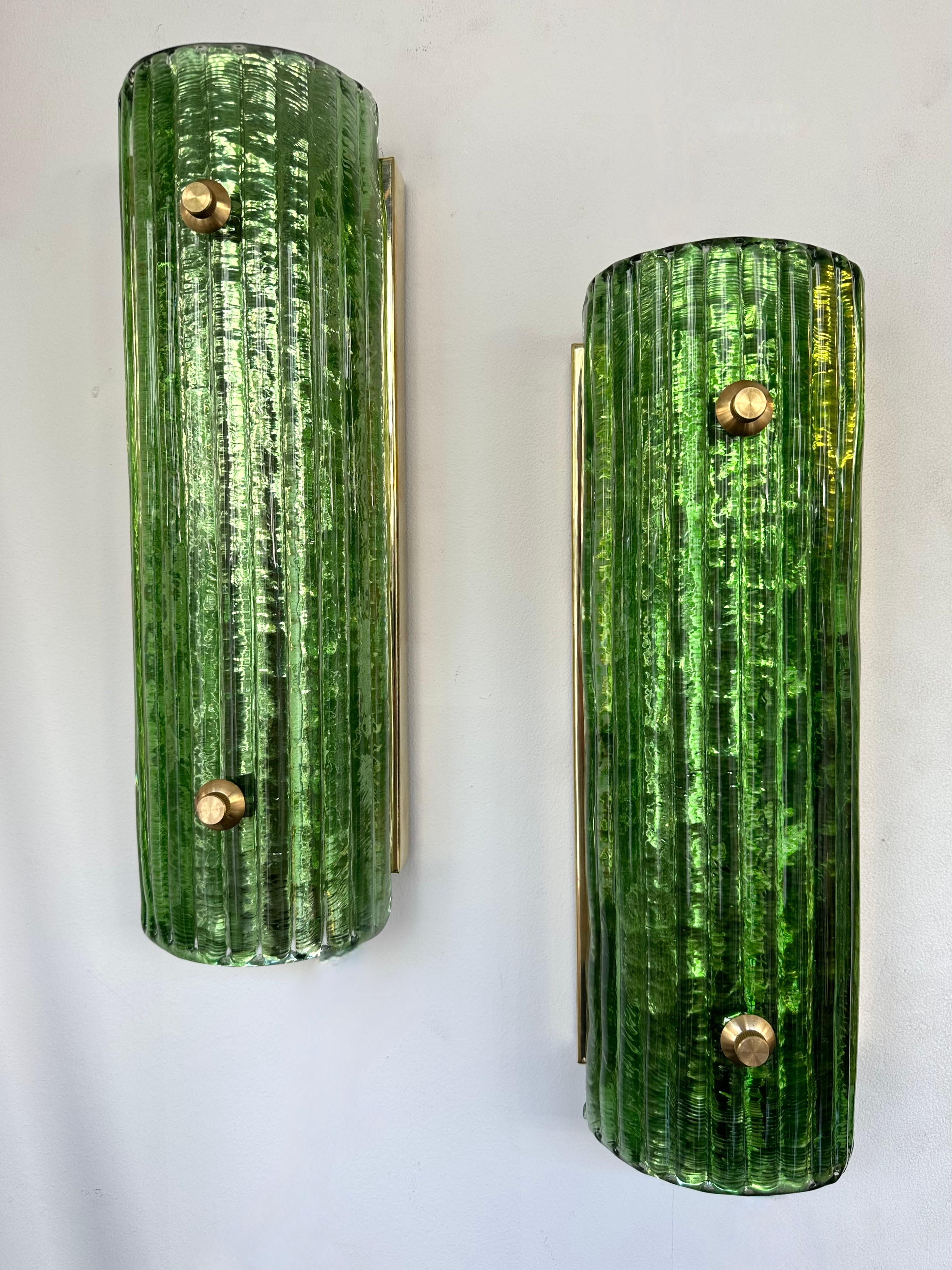 Pair of brass and green Murano glass wall lights lightning pannel lamps sconces. Contemporary work from a small artisanal italian design workshop. In the mood of Mid-Century Modern, Hollywood Regency palm tree, Venini, Mazzega, La Murrina, Veronese,