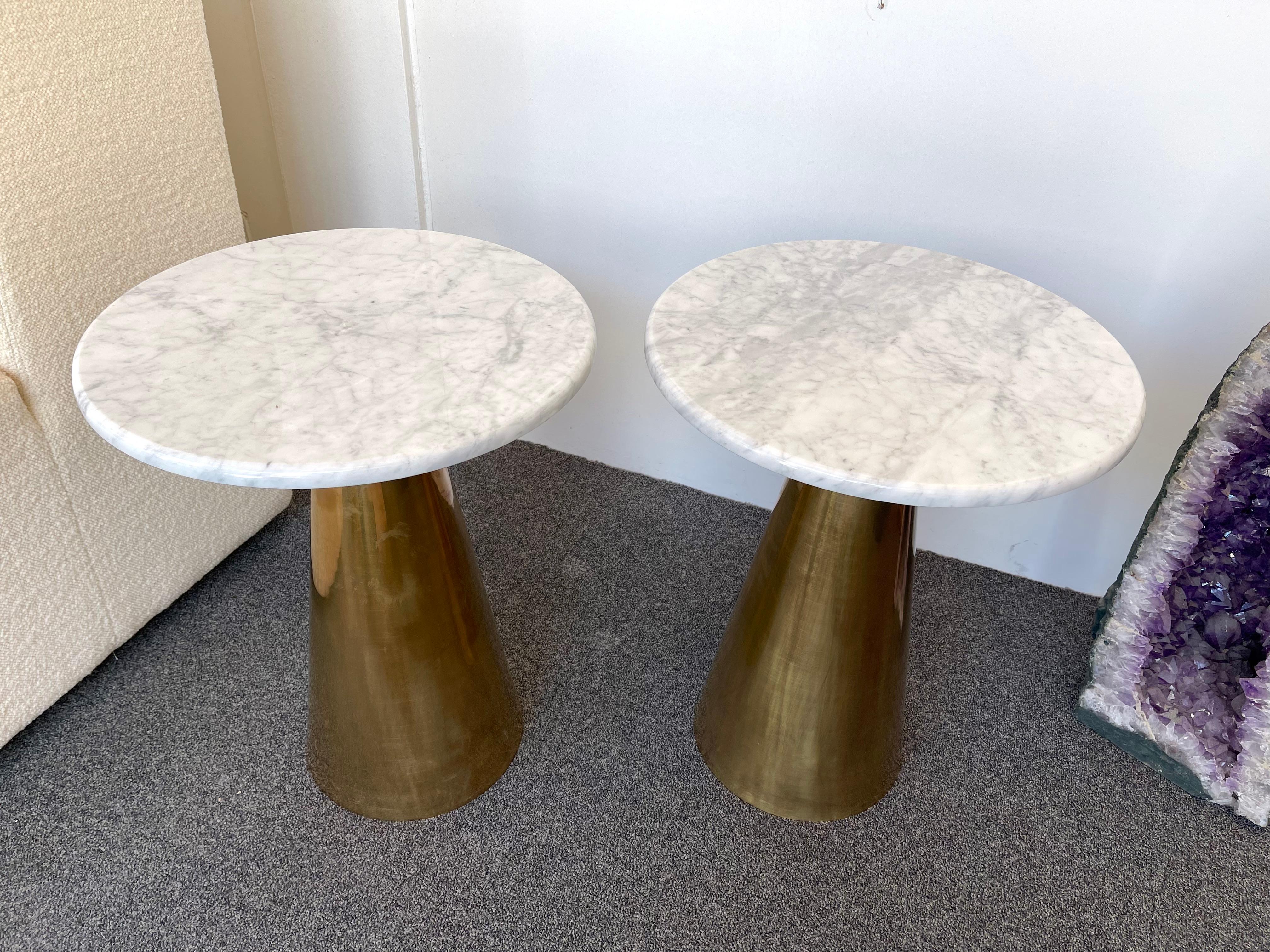 Contemporary pair of side end low coffee tables or nightstands in brass and carrara marble. Small artisanal production from an italian design workshop. In the mood of Mid-Century Modern 1970s, Angelo Mangiarotti.