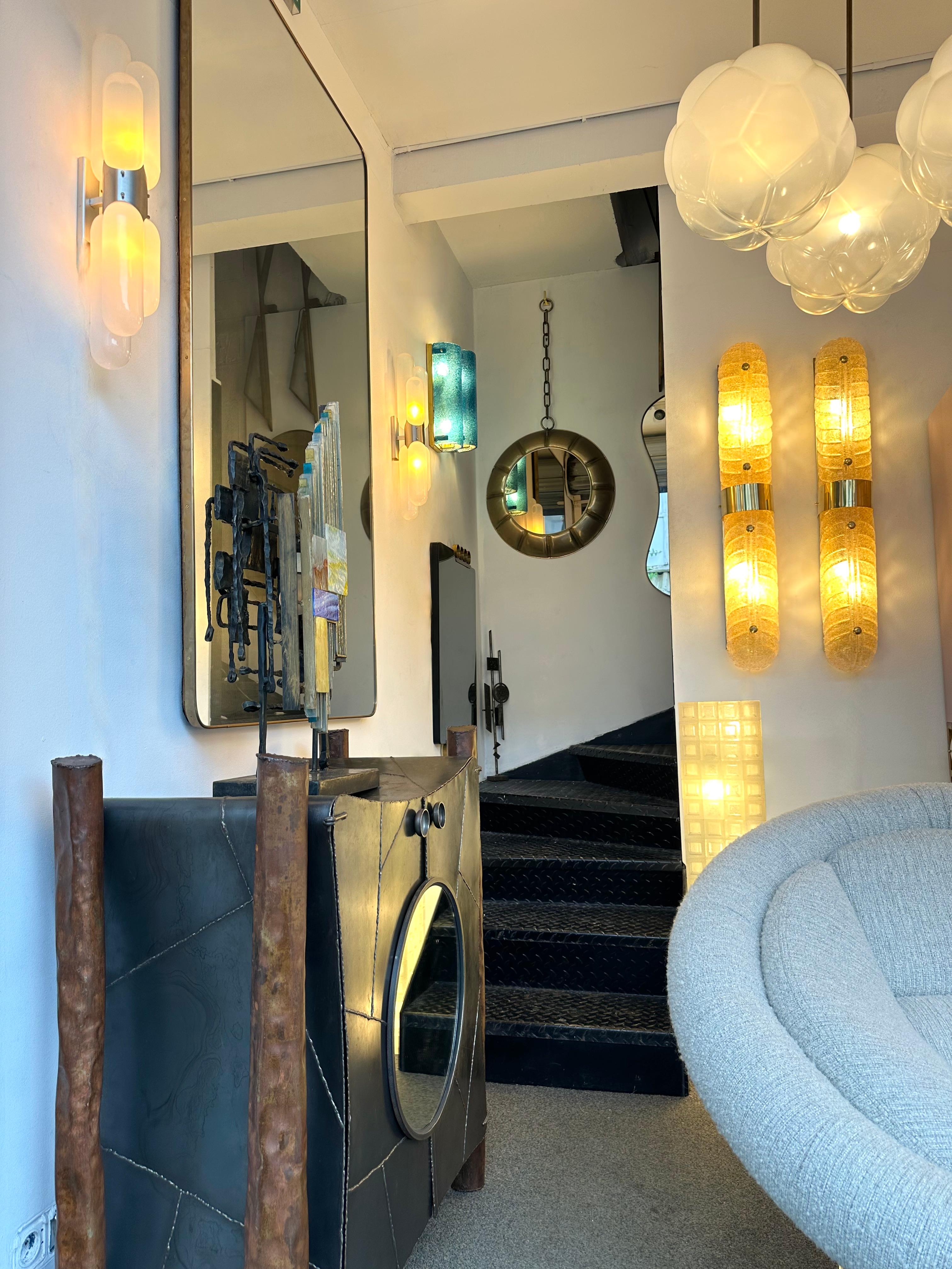 Large Pair of brass and yellow gold amber Palm Murano glass wall lights lightning pannel lamps sconces. Contemporary work from a small artisanal italian design workshop, minor imperfections due to handmade. In the mood of Mid-Century Modern,