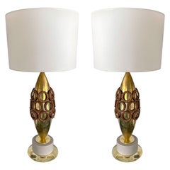 Paire de lampes contemporaines en laiton et anneaux en bois, Italie