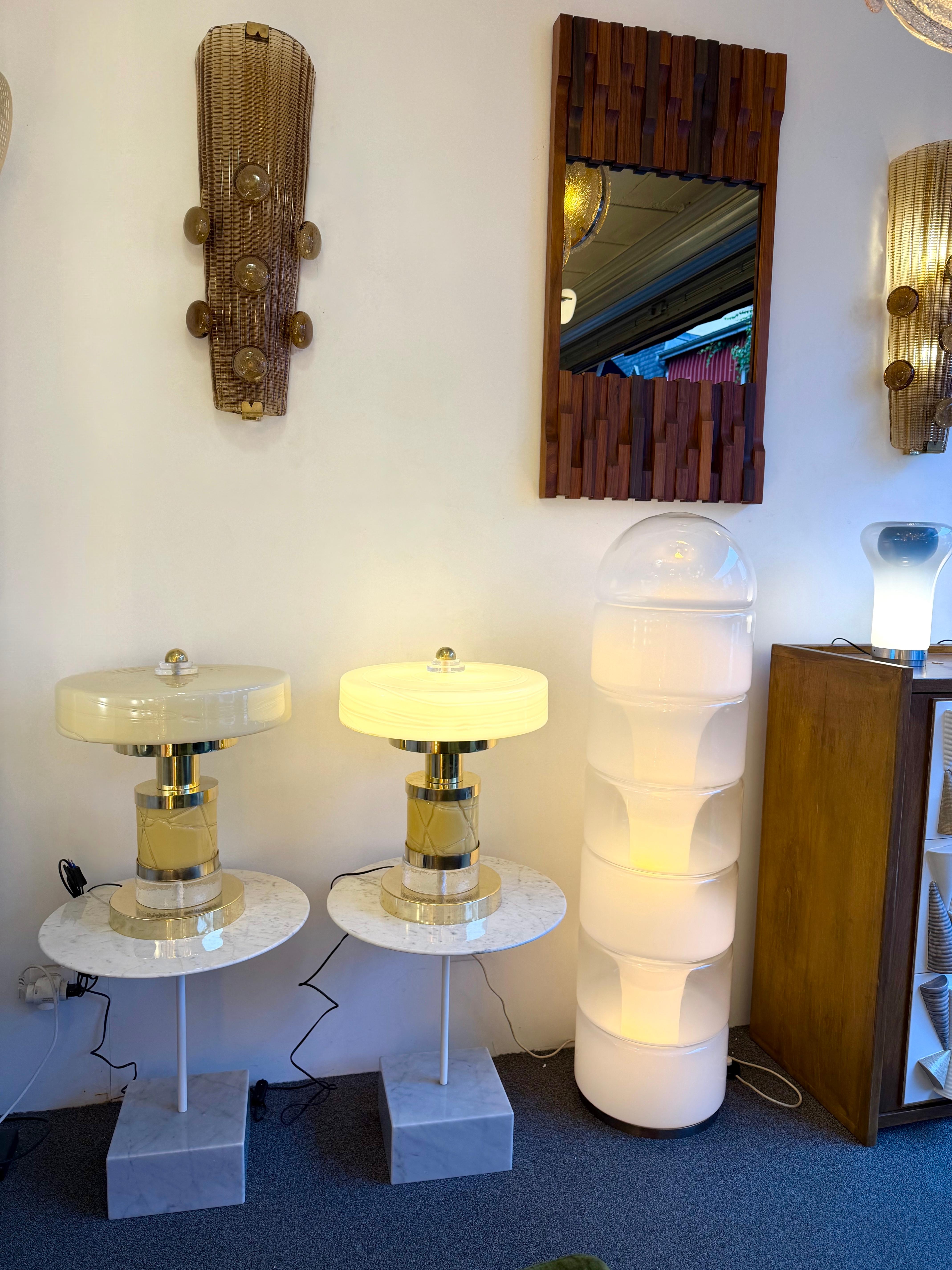 Pair of table or bedside Giro brass lamps and yellow textured blown Murano glass. Contemporary work from a small italian artisanal workshop. Minor imperfections due to handmade work. In the mood of Mid-Century Modern , Space Age, Venini, Vistosi, La
