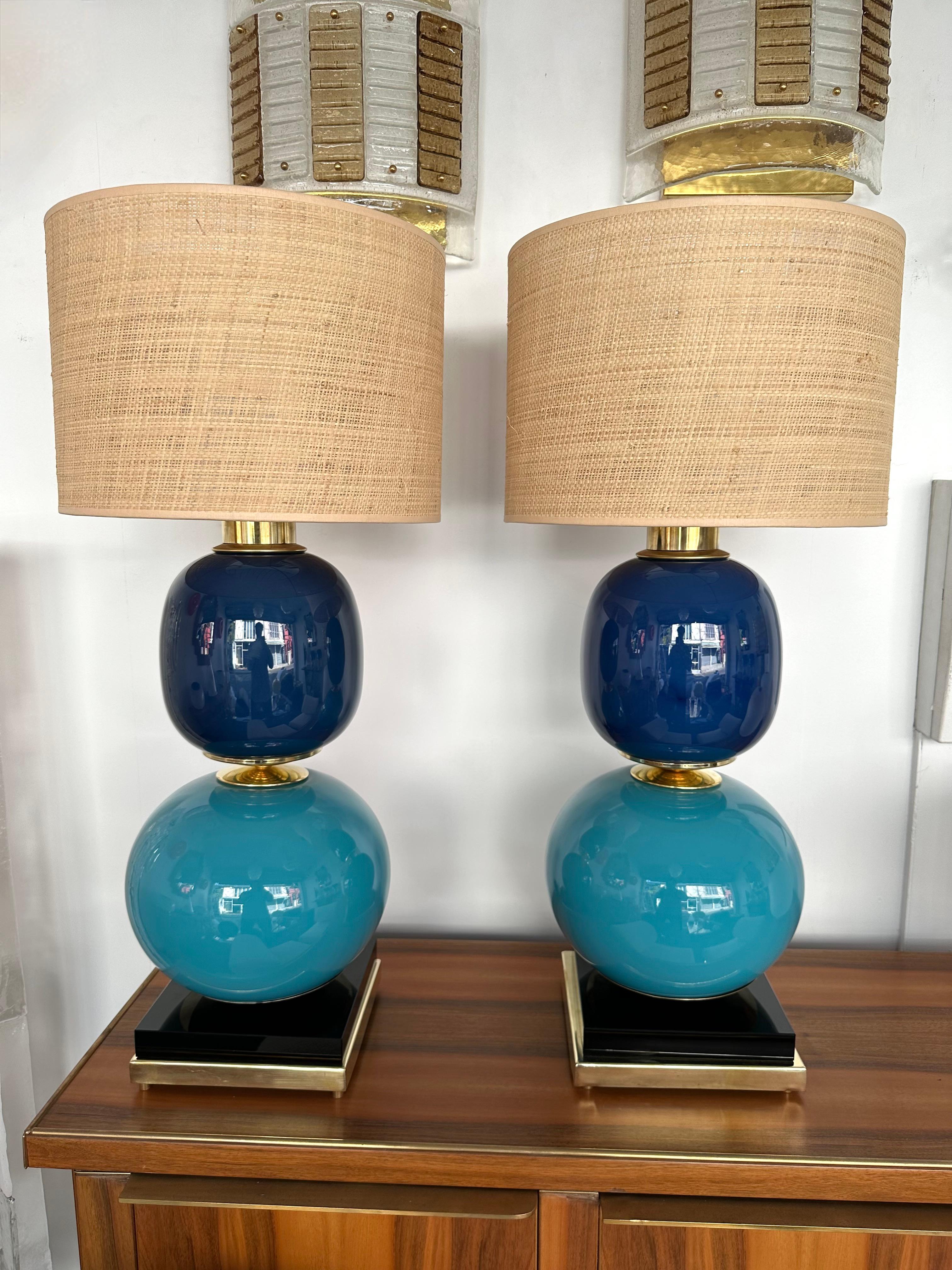 Pair of table or bedside brass lamps, blue and turquoise Murano glass. Contemporary work from a small italian artisanal workshop in a Mid-Century Modern Space Age Hollywood Regency, Memphis 1980s mood.

Demo Shades are not included.
Measurements in