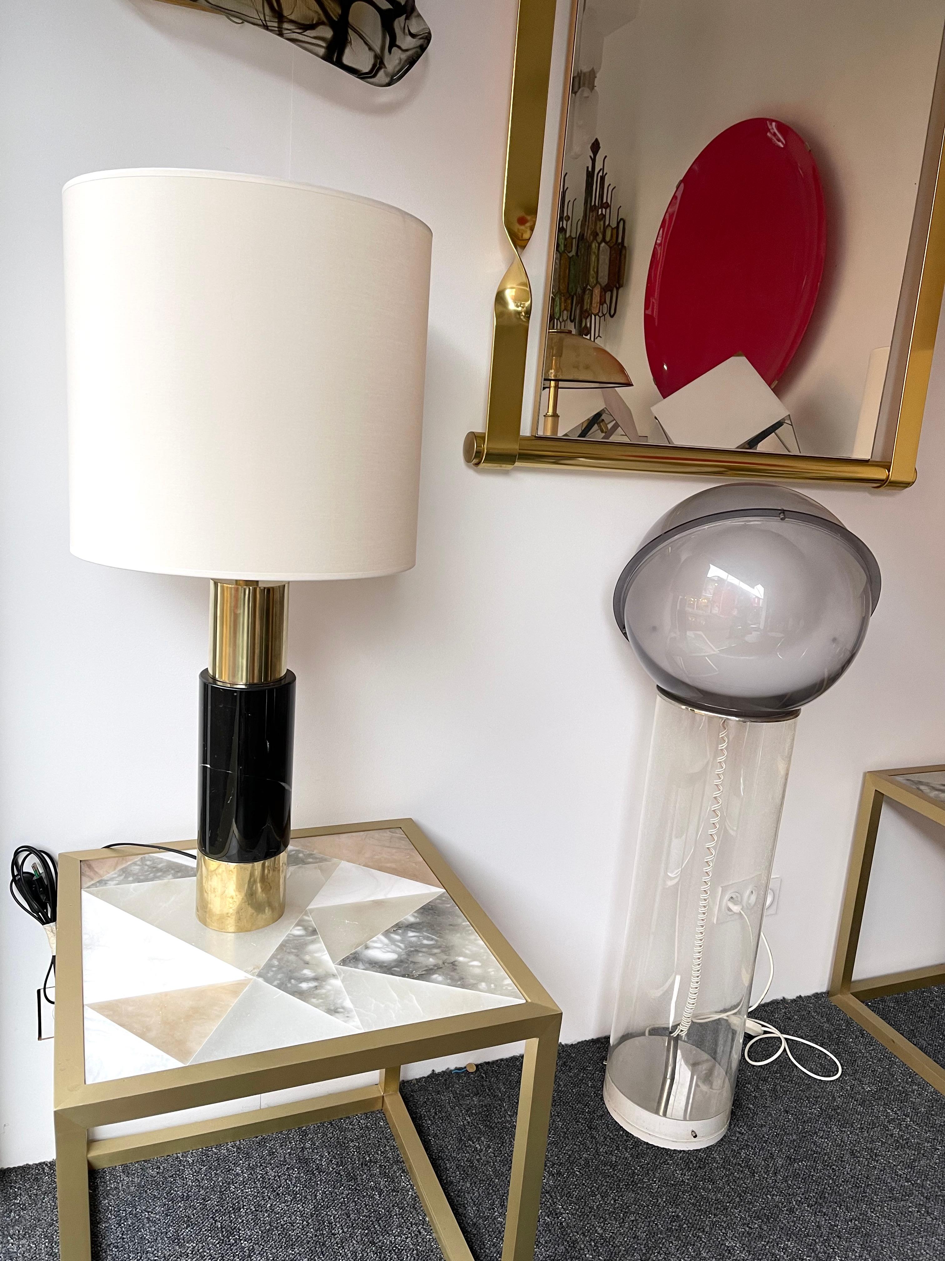 Pair of contemporary table or bedside lamps brass and massive body in black marble stone a variant like granite or travertine. Few exclusive production from a small italian design workshop. In the style of Mazzega, Veronese, Poliarte, Venini,