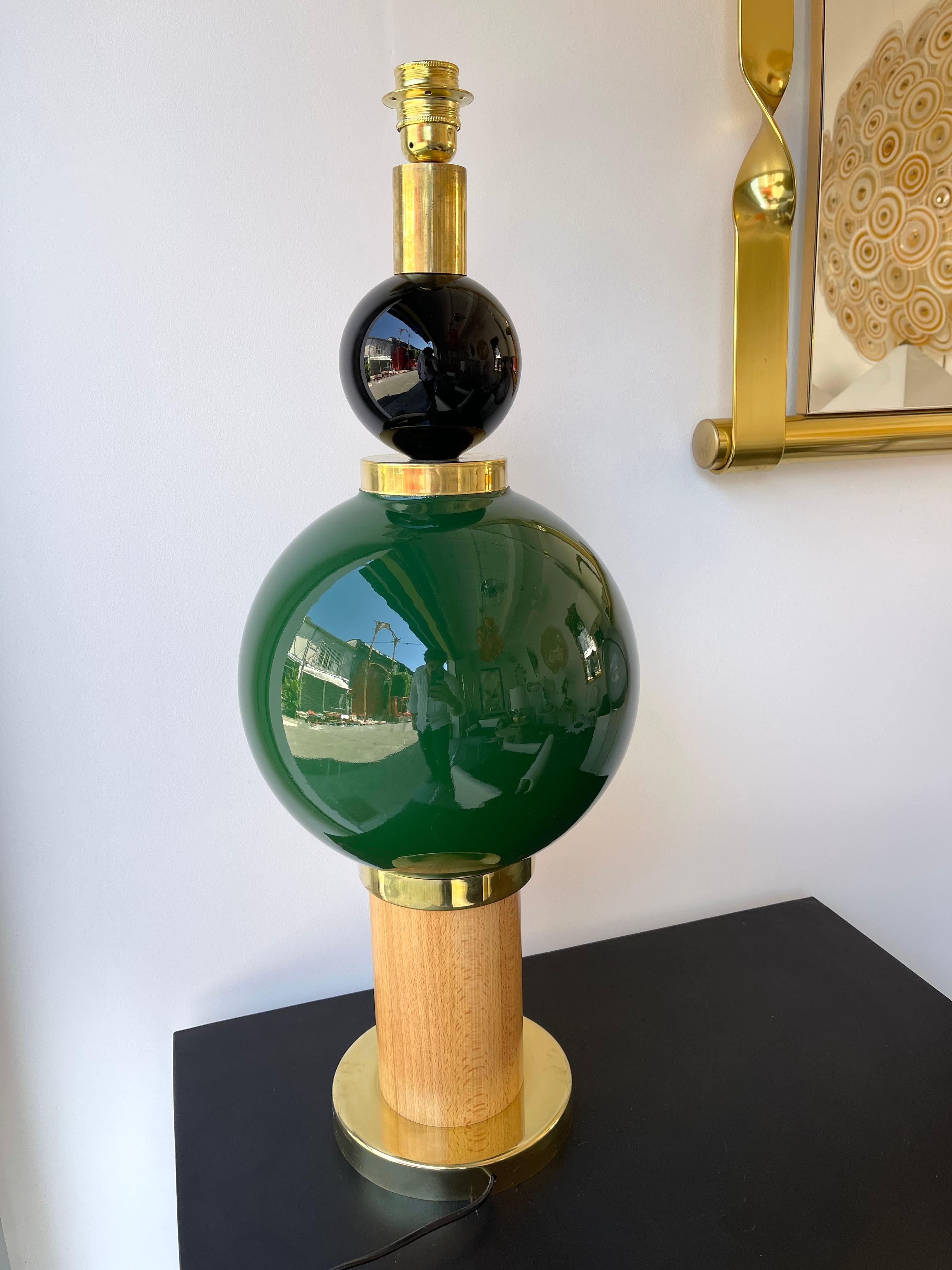 Pair of table or bedside brass lamps, Murano glass and wood. Contemporary work from a small italian artisanal workshop.

Demo shades not included.
Measurements in description with demo shades
Measurements lamp only H 79 x W 28 x D 28 cms.