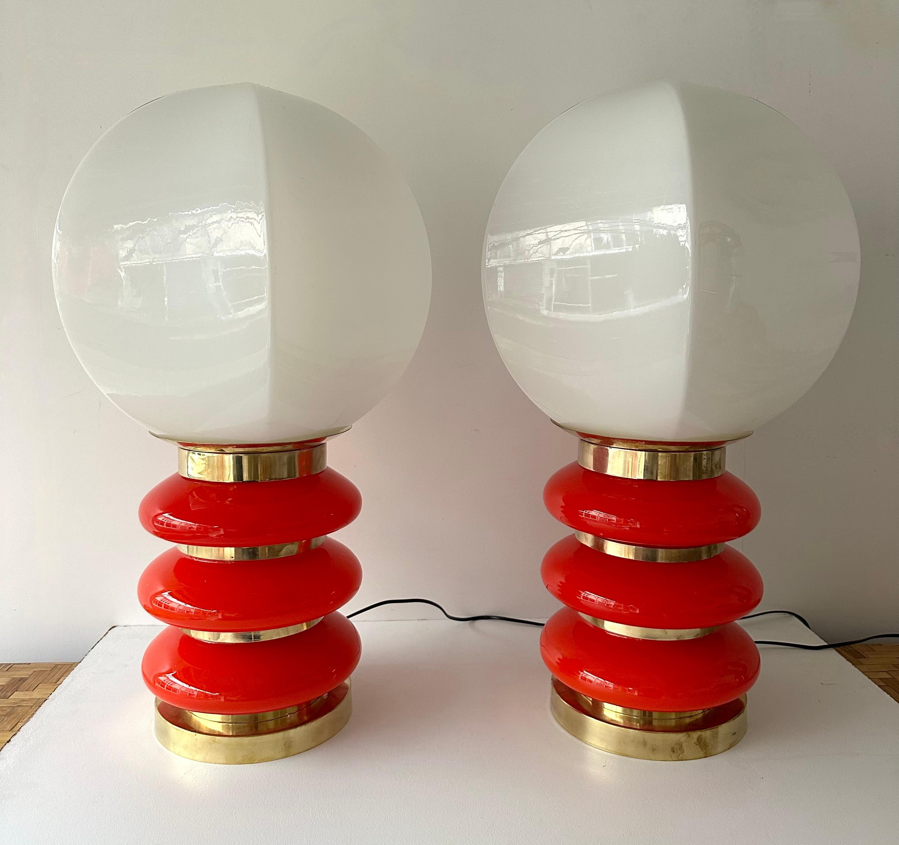 Pair of table or bedside brass balloon lamps in red orange coral Murano glass and special shape white murano globe bulb . Contemporary work from a small italian artisanal design workshop, minor imperfections due to handmade, in a Mid-Century Modern