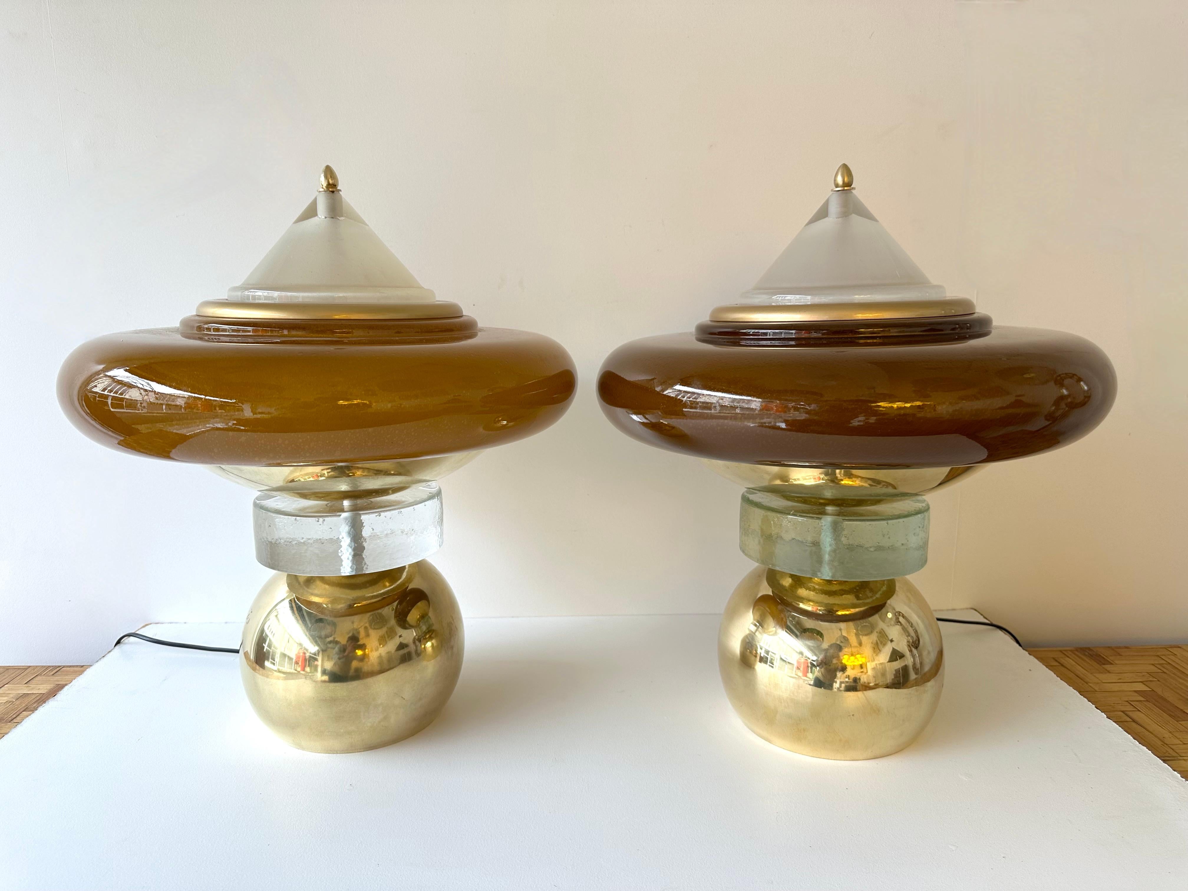 Pair of table or bedside brass lamps Mushroom in amber Murano glass. Contemporary work from a small italian artisanal workshop, minor imperfections due to handmade, in a Mid-Century Modern Space Age Hollywood Regency mood.
