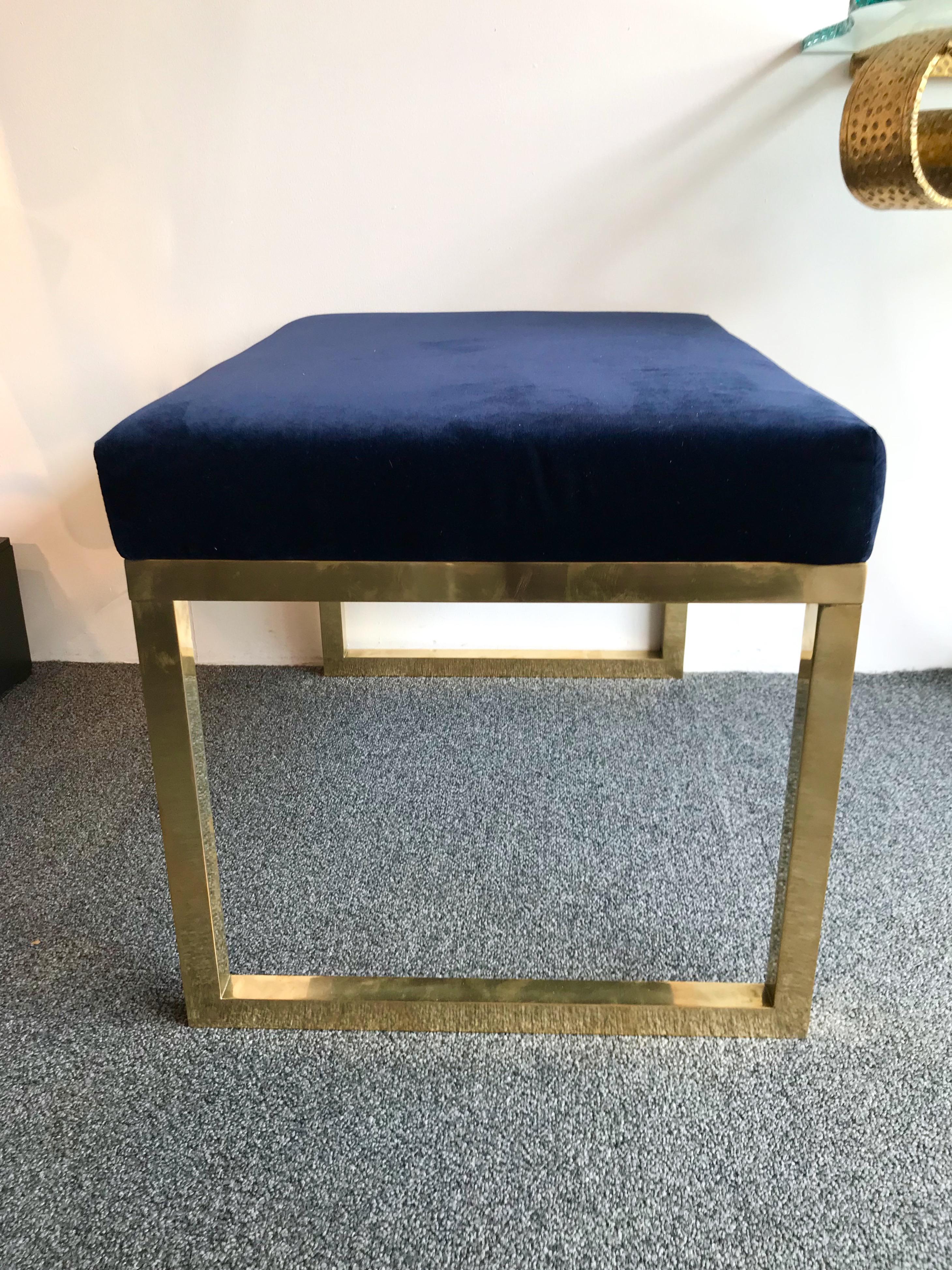 Large pair of poufs stools, footstools or ottomans in natural brass with a nice blue velvet fabric.