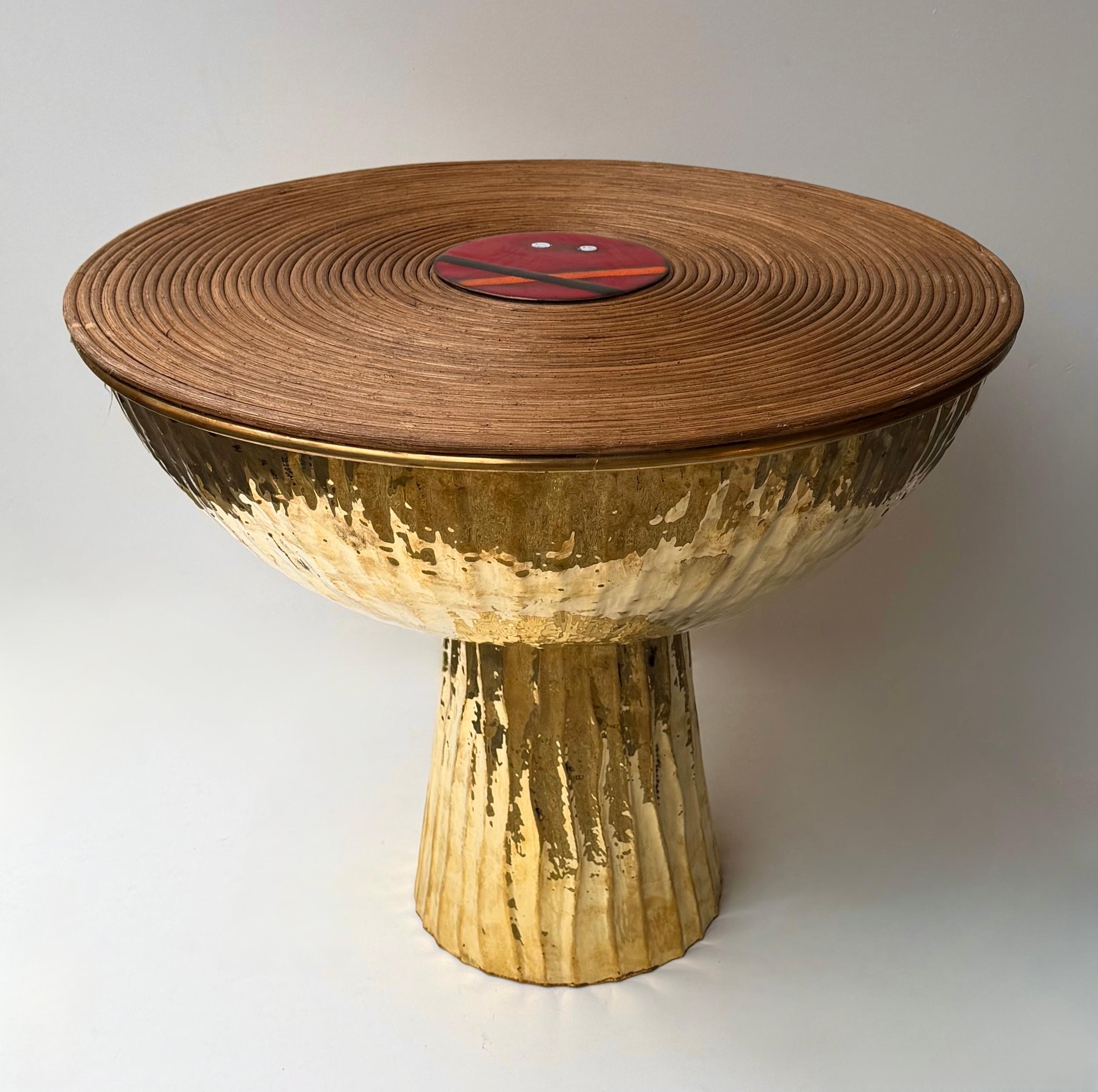 Pair of Contemporary side end low coffee cocktail side bed tables or nightstands in  hammered brass base, nice rattan wicker bamboo top with enamel metal decor. Contemporary work from a small artisanal italian design workshop. Minor imperfections