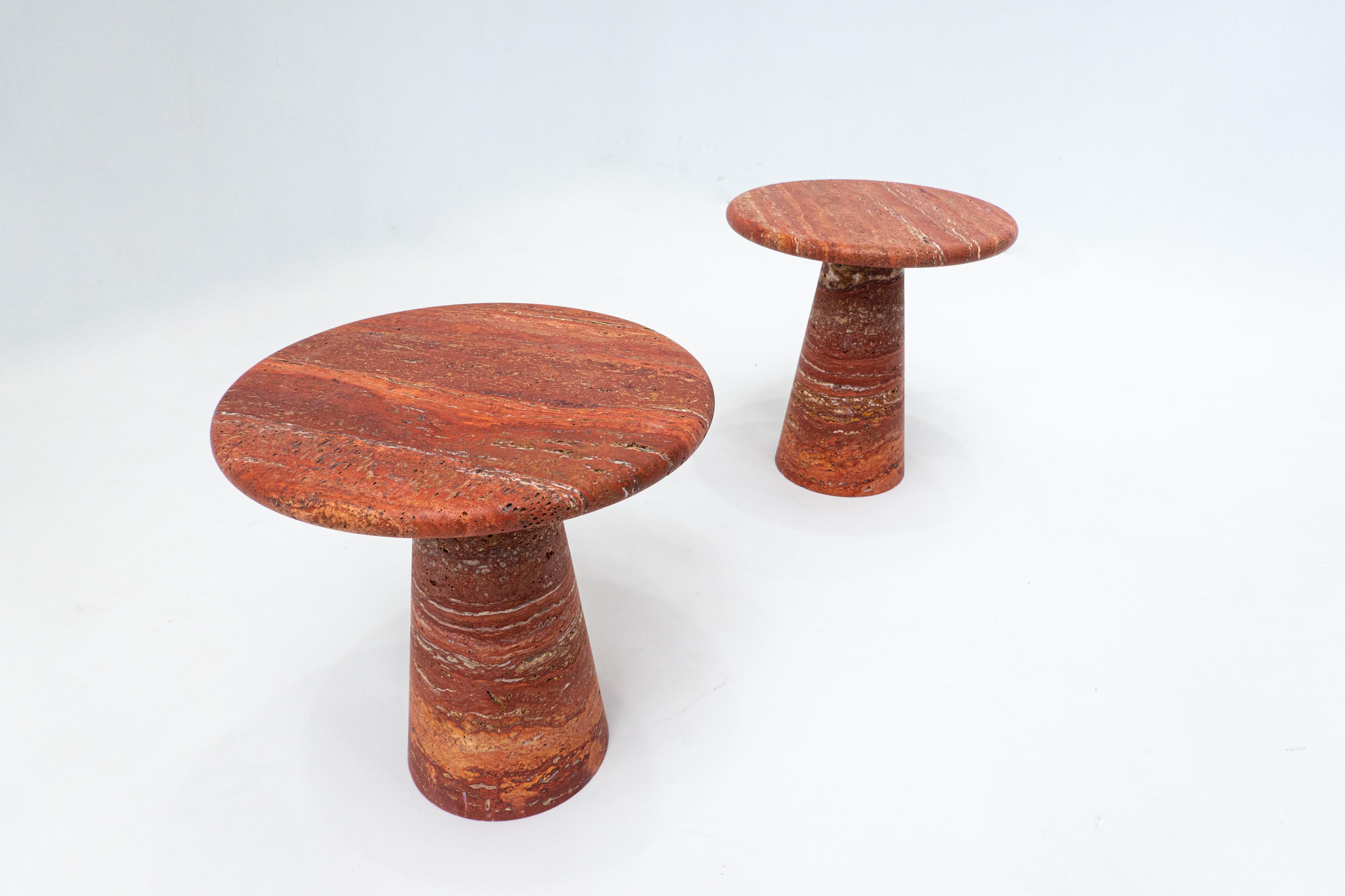Contemporary pair of Italian red travertine side tables.