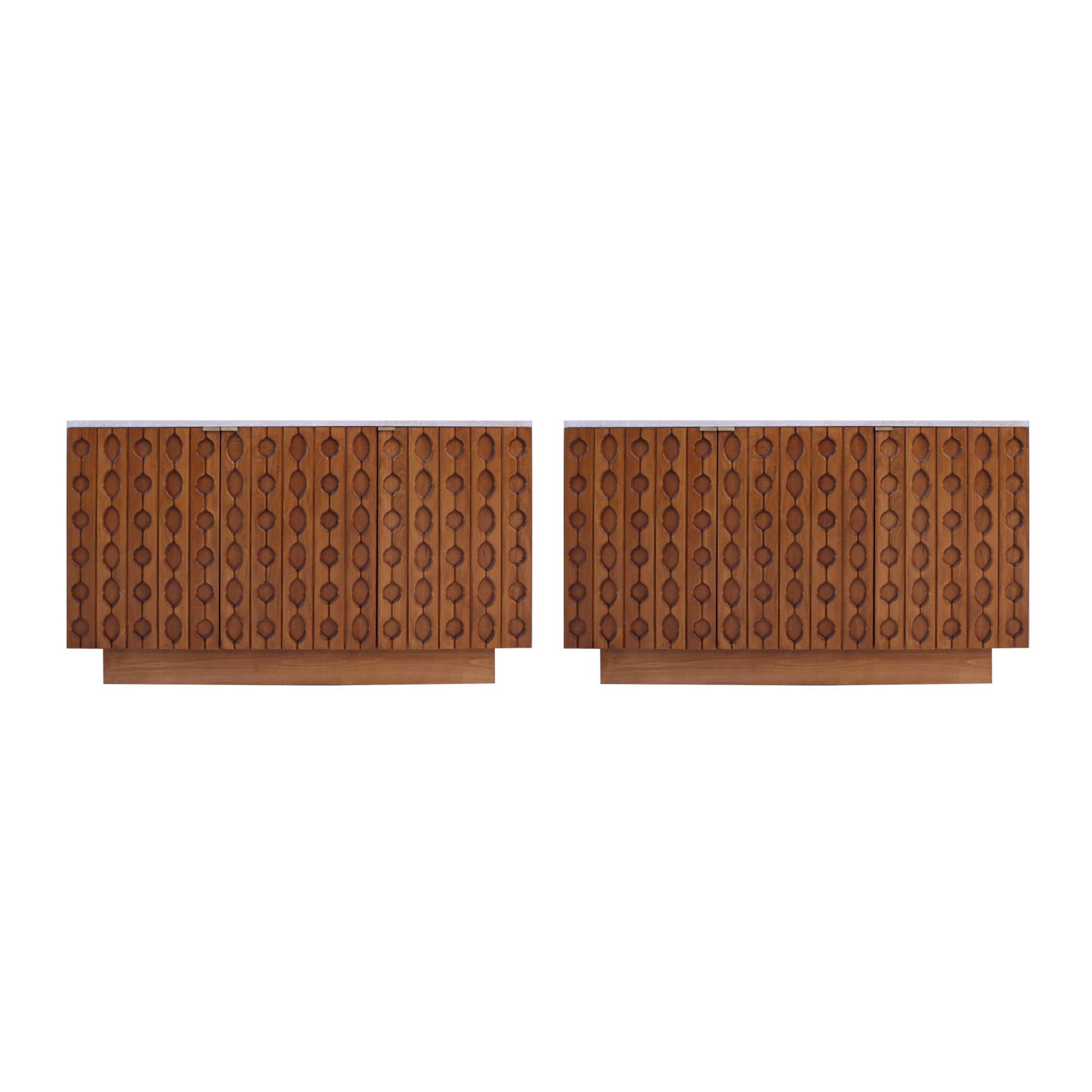 Pair of contemporary sideboards made of solid oak and birch wood, with specific measures (19.69”D 46”W 33.08”H). Composed of 2 folding doors, a wooden shelf inside and a travertine top.

Every item LA Studio offers is checked by our team of 10