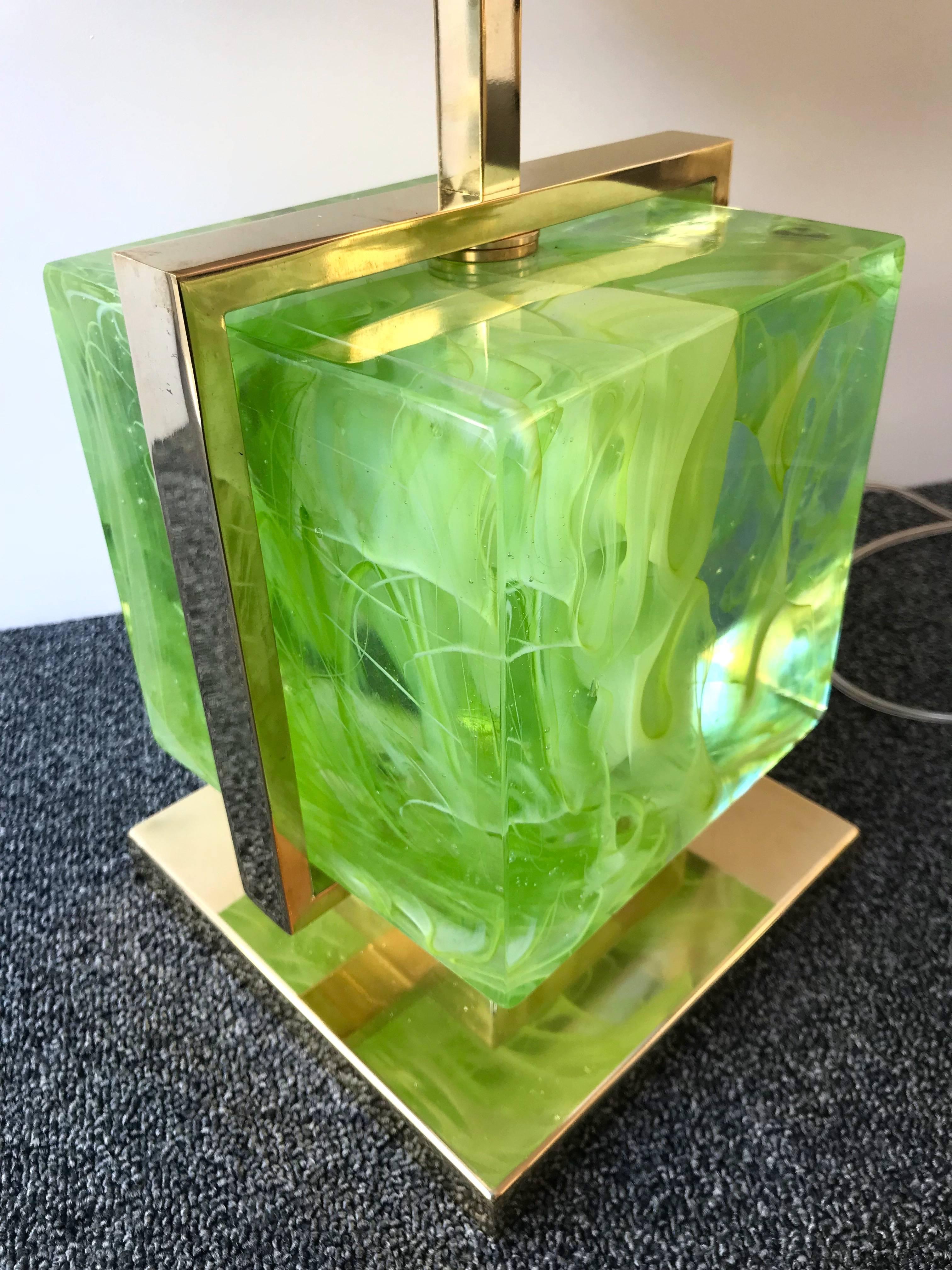 Very fresh pair of brass cage lamps with an impressive and massive green Murano pressed glass cube. Base lamps. Demonstration shades no include. Yellow, red lamps are available on my storefront. In the style of Mazzega, Poliarte, Venini, Vistosi, La
