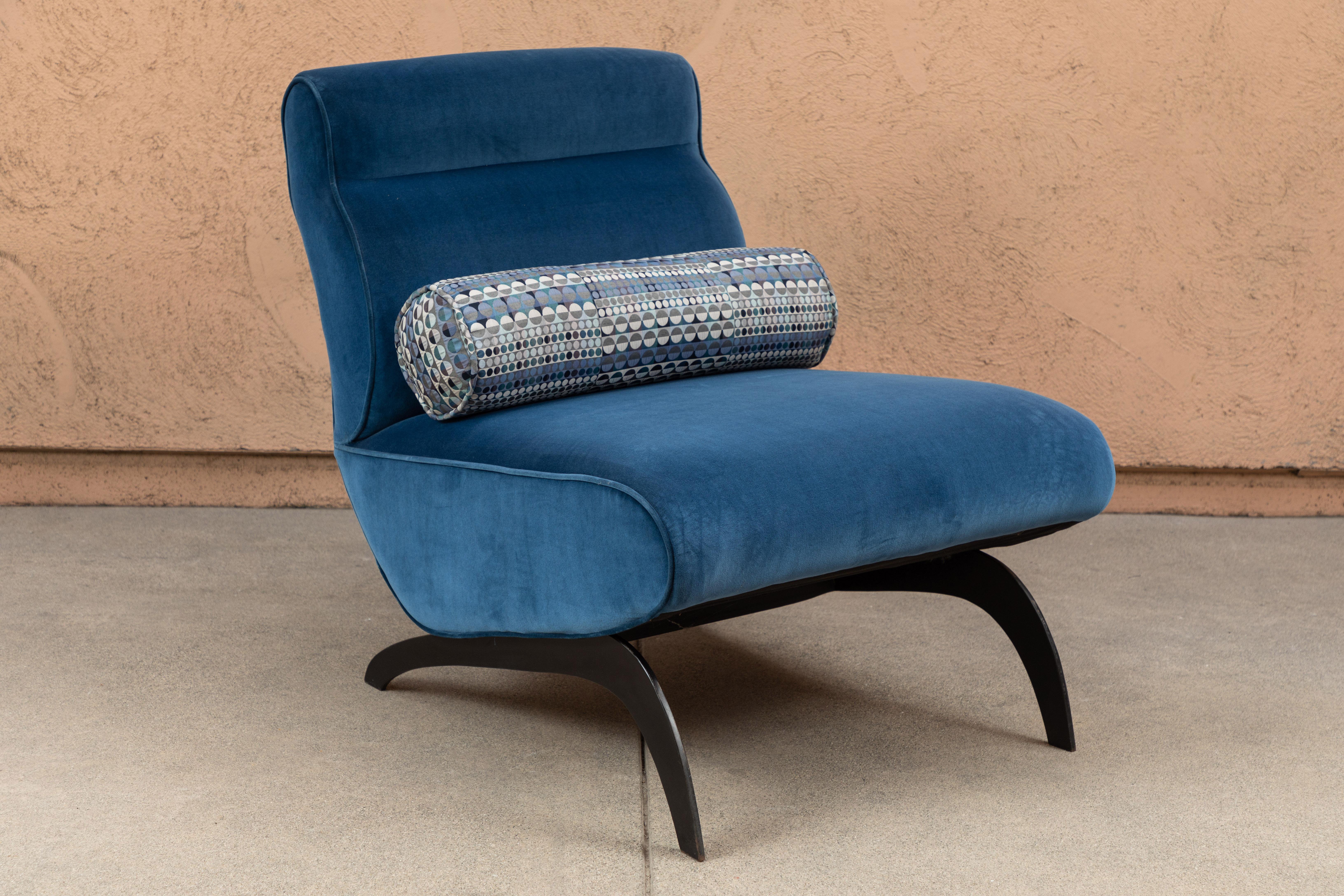 Pair of sleek, low slung lounge chairs with black metal legs ad upholstered in a stunning cobalt Rubelli cotton velvet.
  