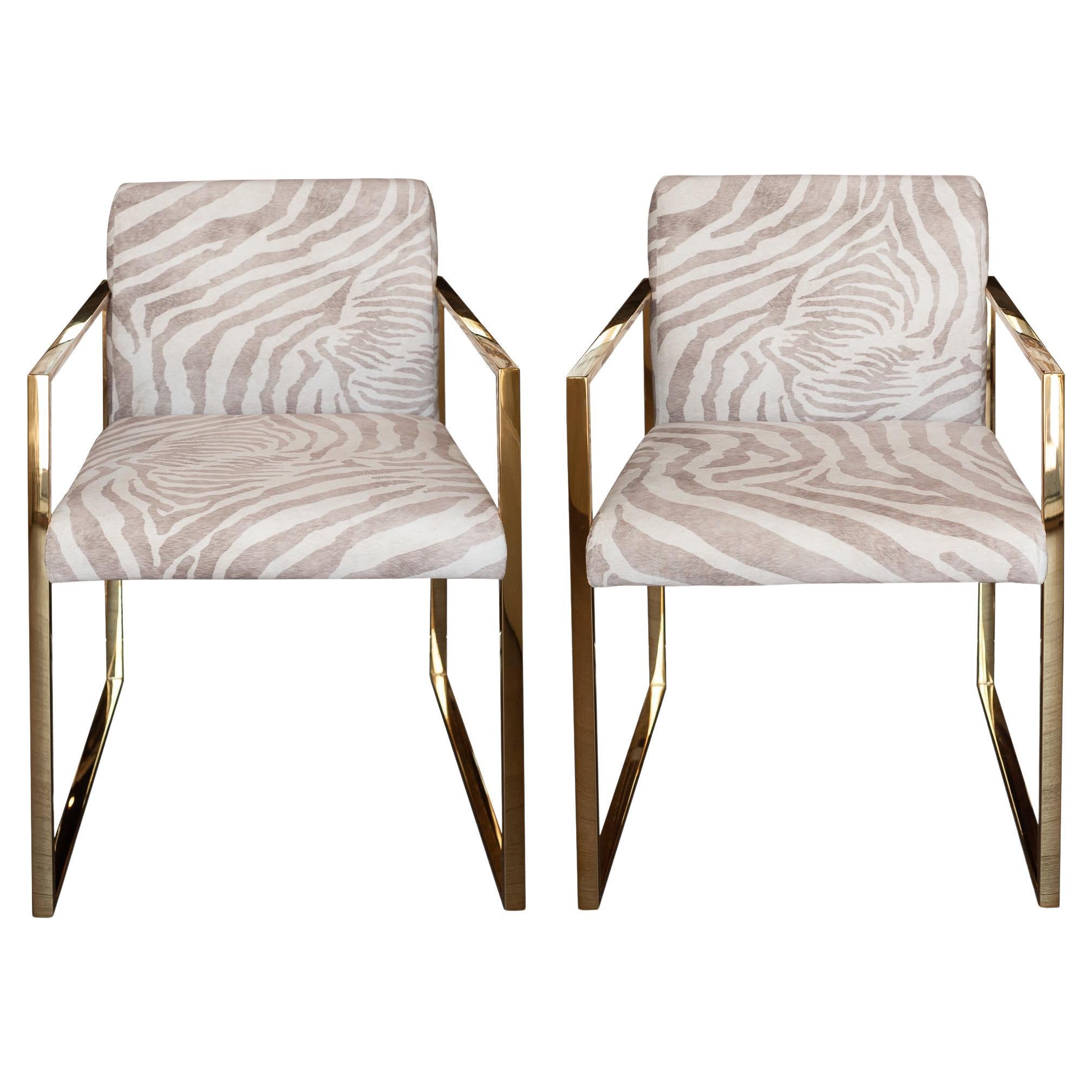 Contemporary Pair of Polished Brass and Zebra-Print Fabric Upholstered Armchairs