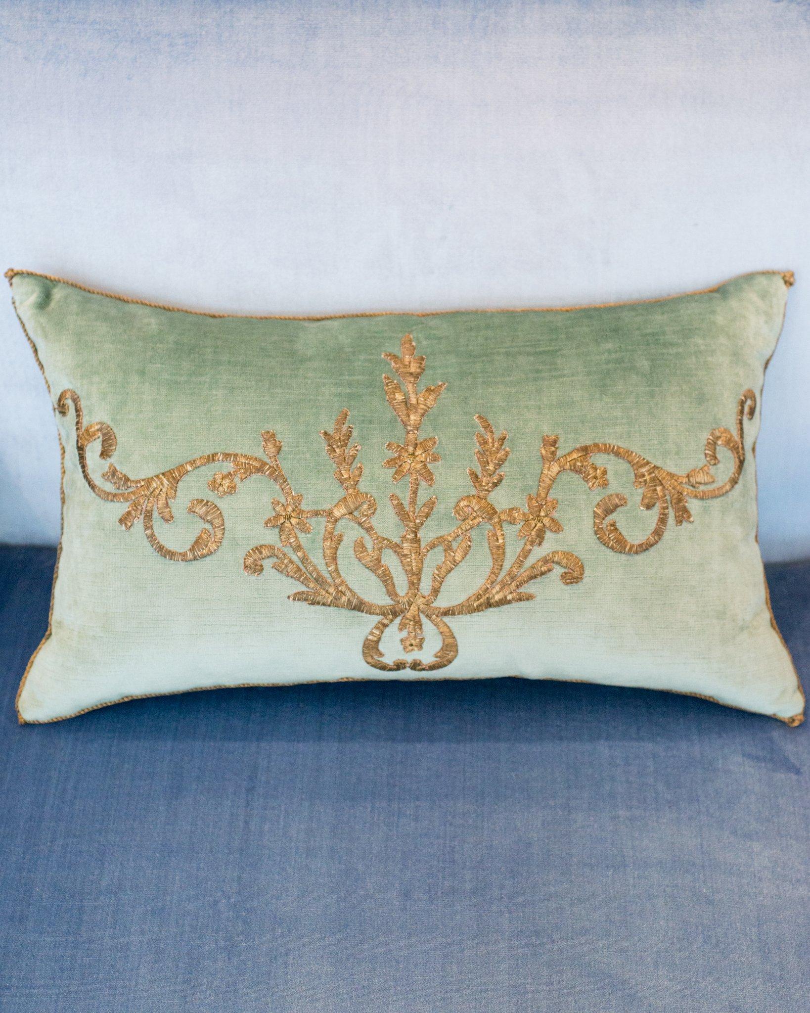 A stunning pair of Rebecca Vizard pillows with Antique Ottoman Empire raised metallic embroidery, hand stitched on aqua velvet.