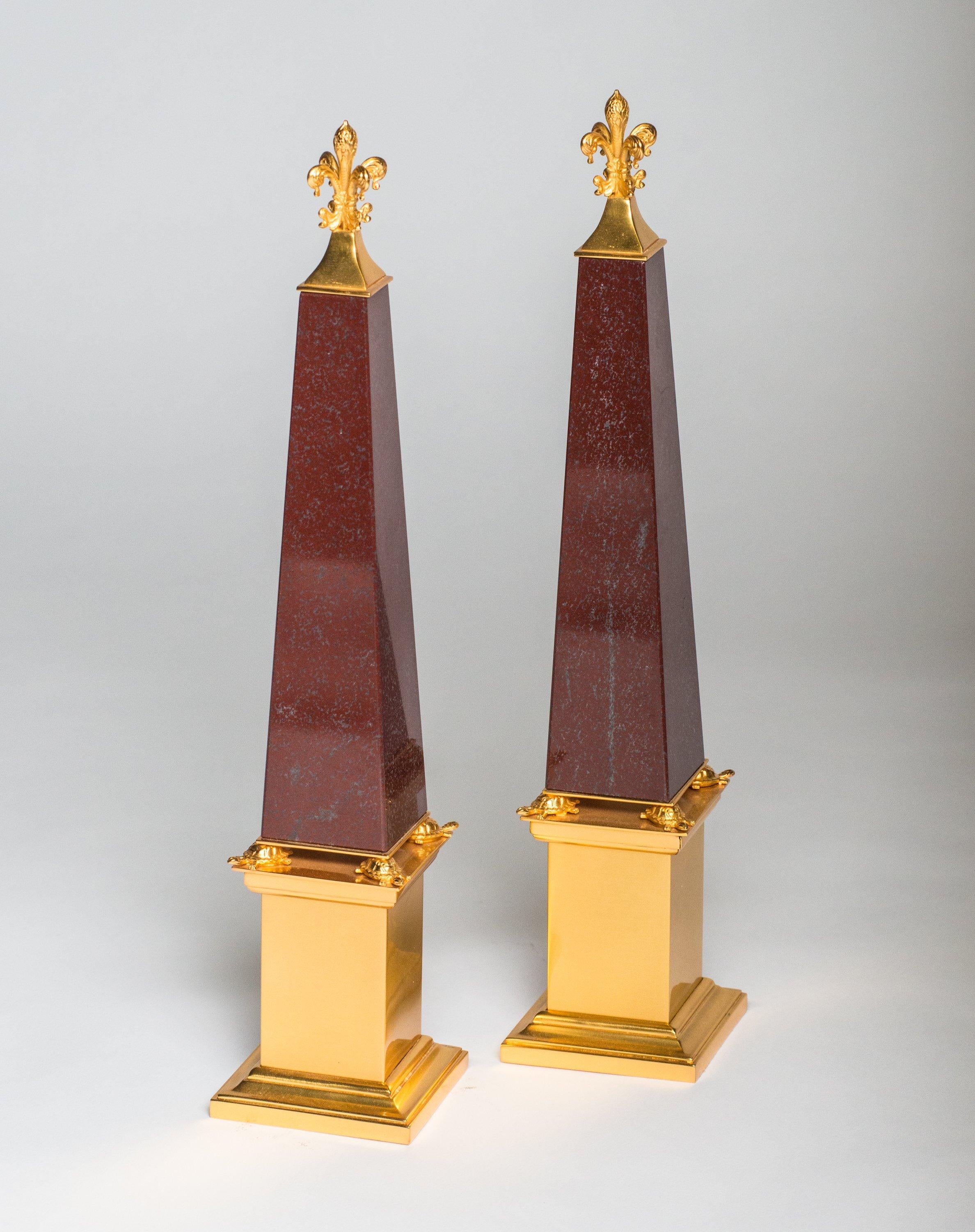 A pair of bronze & red marble obelisks embellished with tortoises made by a master bronze maker in Florence, Italy.