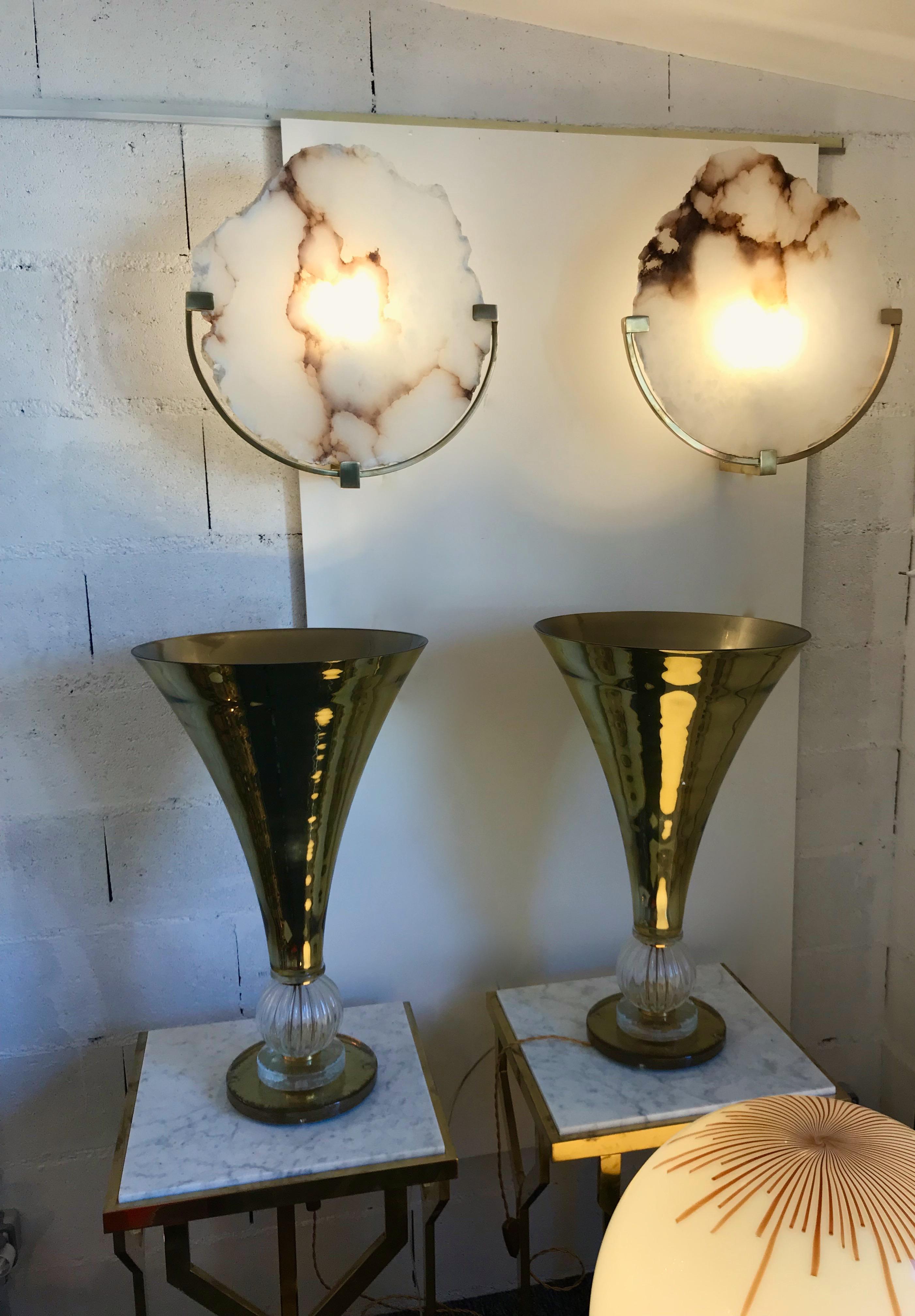 Pair of sconces or wall lights cut alabaster leaves from Carrara Italy and brass structure, made on order by a small Italian workshop. Few exclusive production. Very quality and unusual work, different from marble works.