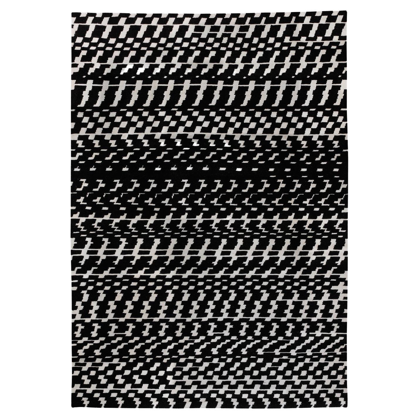 Tapis Kilim Fuoritempo noir et blanc à motifs Paolo Giordano Tapis en laine coton