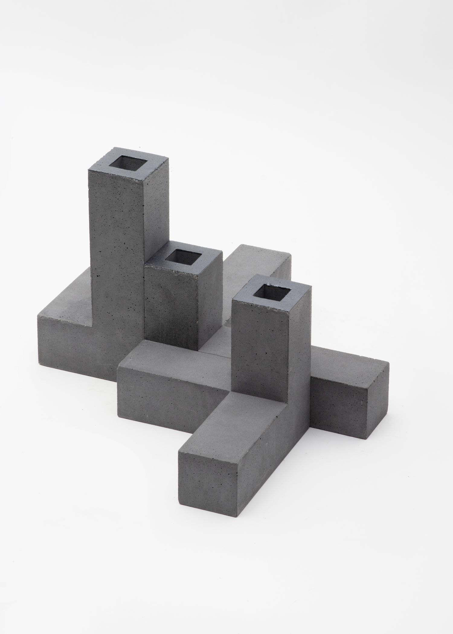 Tre Torri - Natural Concrete

Tre Torri is a small minimal architecture composed of three concrete elements: three towers of different height, composed as a group forming a square base.

The elements can move assuming different positions, always