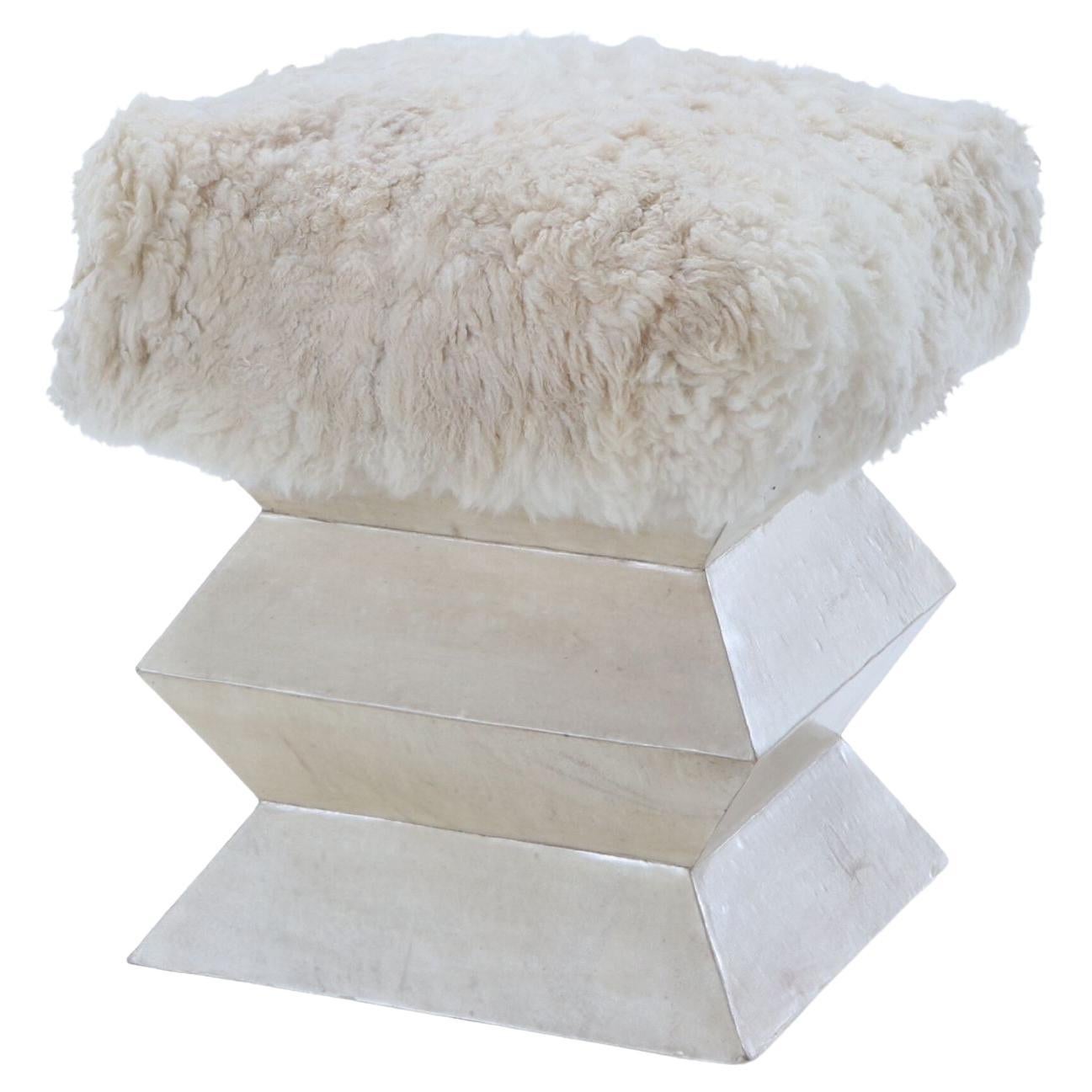 Contemporary parchment covered stool having goat hair upholstery For Sale