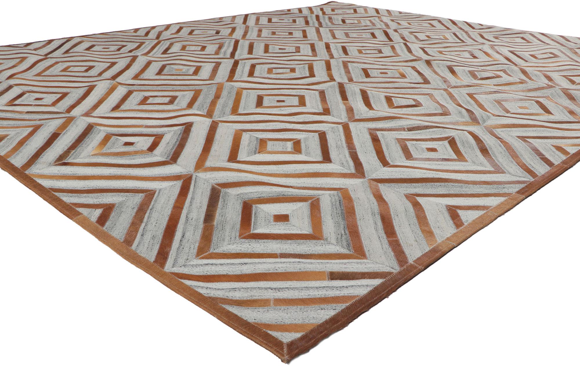 30914 New Cowhide Patchwork Rug, 08'00 x 09'11. ​Call the wild indoors and bring a sense of adventure home with this handcrafted cowhide rug. Showcasing a modern design, incredible detail and texture, this leather cowhide rug is a captivating vision