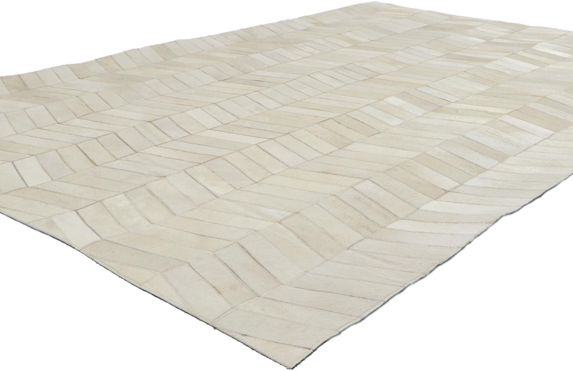 30907 Contemporary Patchwork Cowhide Rug with Modern Style, 05'00 x 07'05. Call the wild indoors and bring a sense of adventure home with this handcrafted cowhide rug. Showcasing a modern design, incredible detail and texture, this leather cowhide