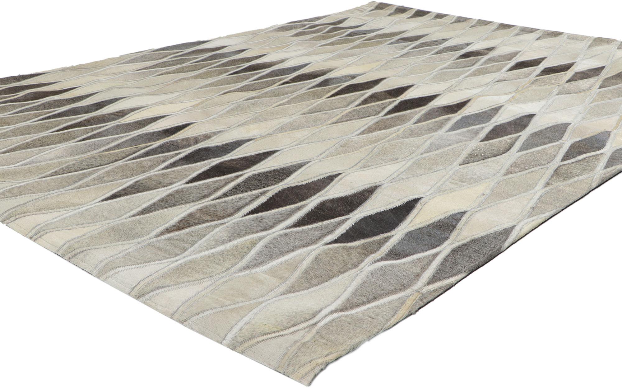 30906 Contemporary Patchwork Cowhide Rug with Modern Style, 05'04 x 07'05. Call the wild indoors and bring a sense of adventure home with this handcrafted cowhide rug. Showcasing a modern design, incredible detail and texture, this leather cowhide