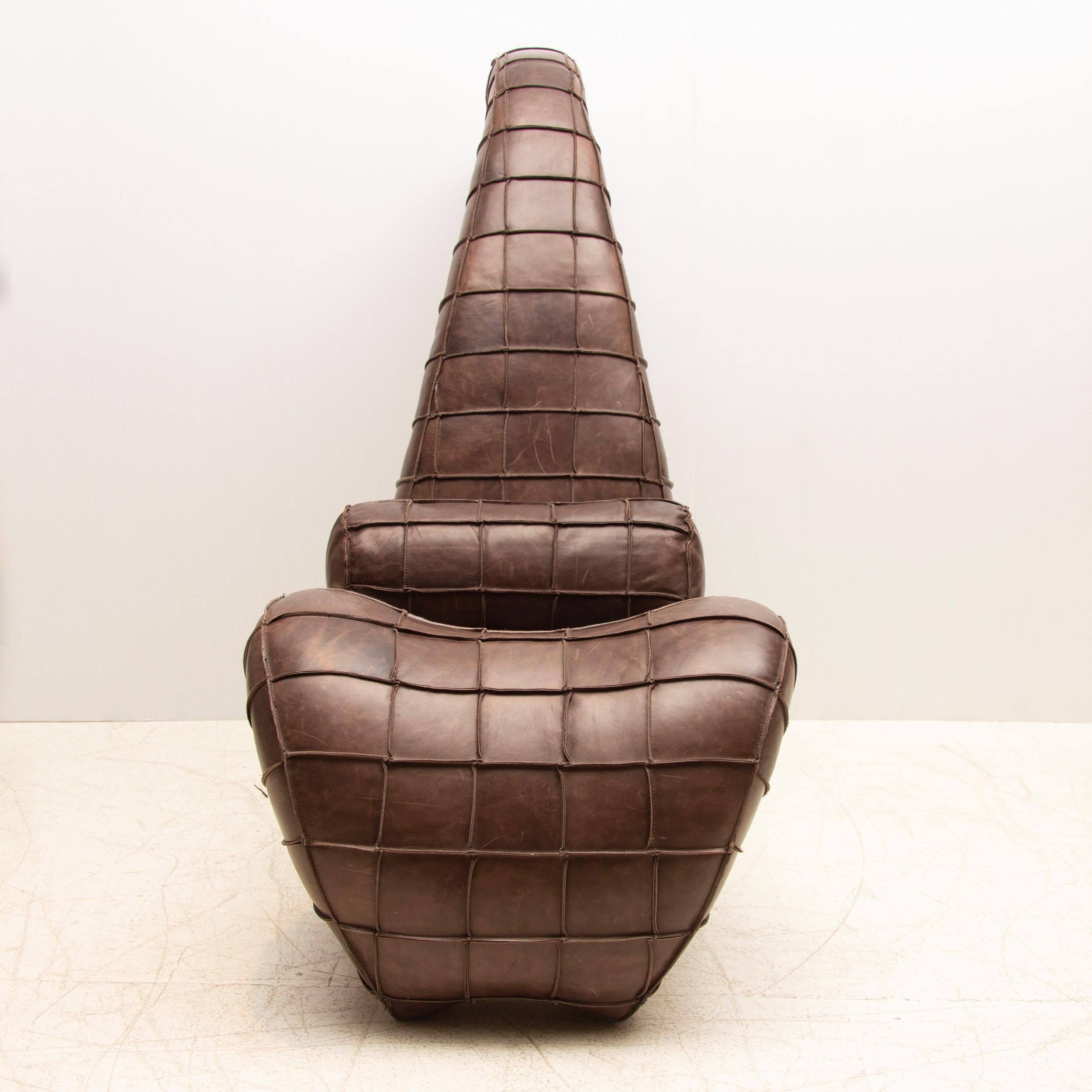 Contemporary midcentury style patchwork leather scorpion chair by Jools Hannon for Chi Design
Measures: Height: 117 cm Width: 63 cm Depth: 138 cm
Ireland, circa 2018.
  