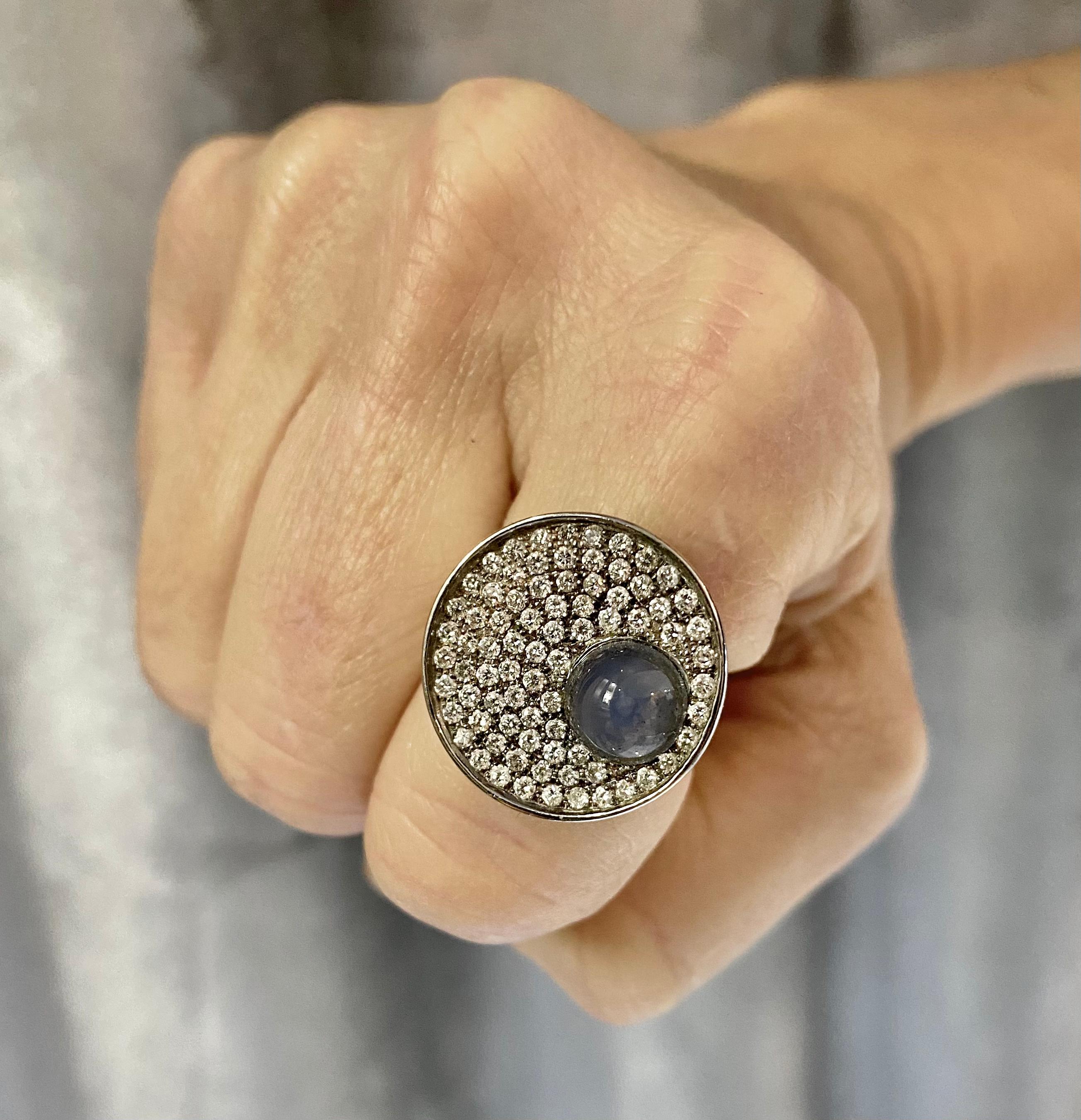 This contemporary pave diamond ring adorned with a natural blue calcedony makes the perfect statement ring. If you want to upgrade your look by adding a design piece or add some light to your hands this is the right ring. Its pave diamonds casted on